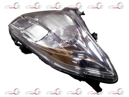 CarTrends Swift Dzire right headlight showing clear lens and reflective surfaces, designed for easy installation and optimal visibility.