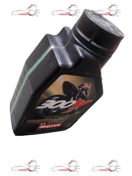 MOTUL 15W50 300V motor oil spare parts container with label and cap, black and yellow packaging, close-up view.