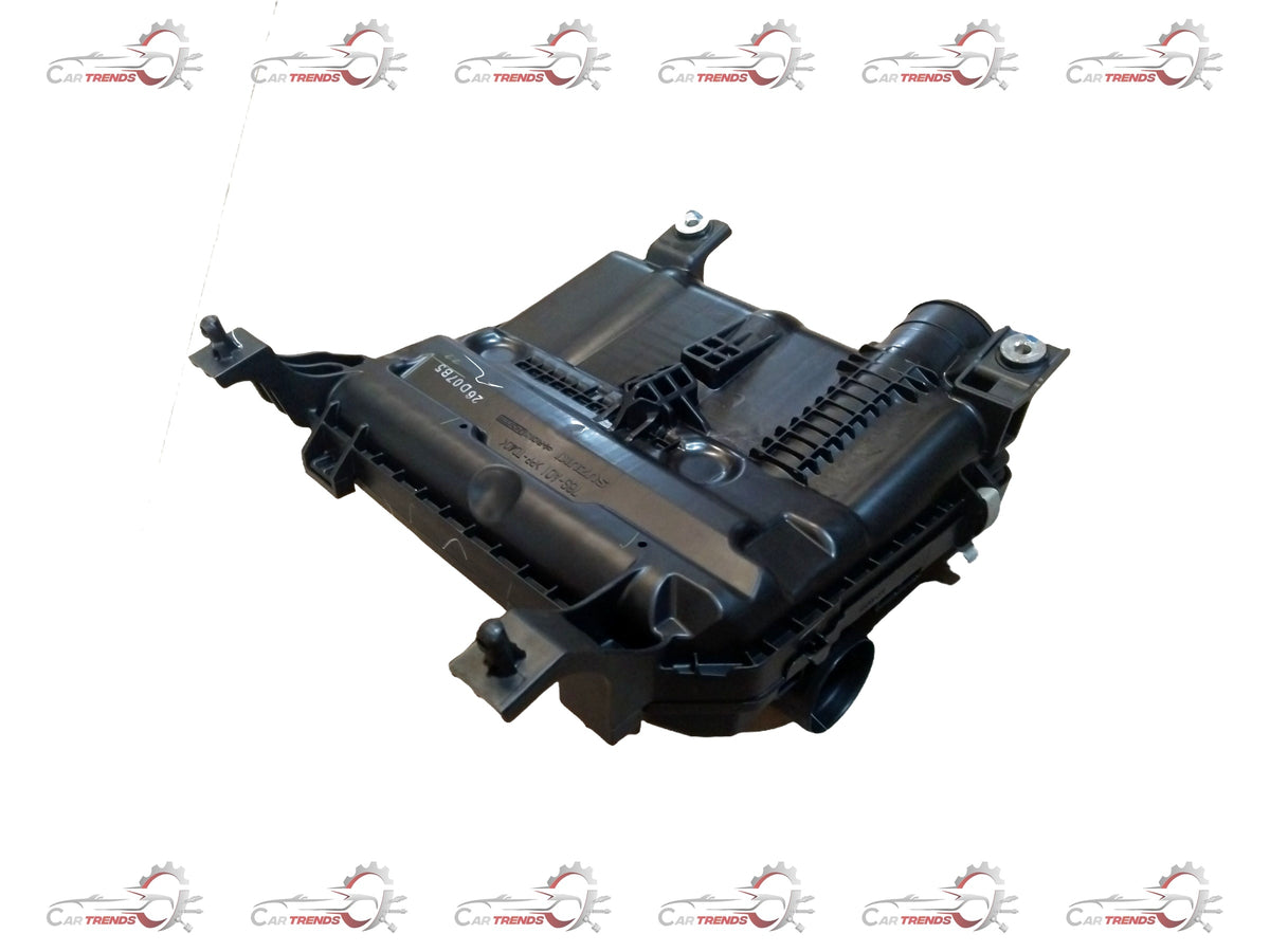 Maruti Suzuki cleaner assembly air part for Suzuki Alto, showing the metallic air cleaner component with hoses and connectors.