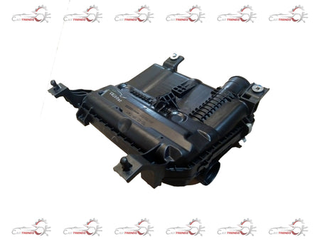 Maruti Suzuki cleaner assembly air part for Suzuki Alto, showing the metallic air cleaner component with hoses and connectors.