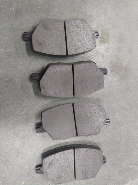 Front brake pad by CarTrends, model SP4006, shown in a close-up image highlighting the brake pad's surface and mounting features.