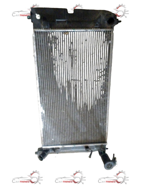 Toyota radiator assembly showing the metal core and plastic tanks, designed for efficient engine cooling.