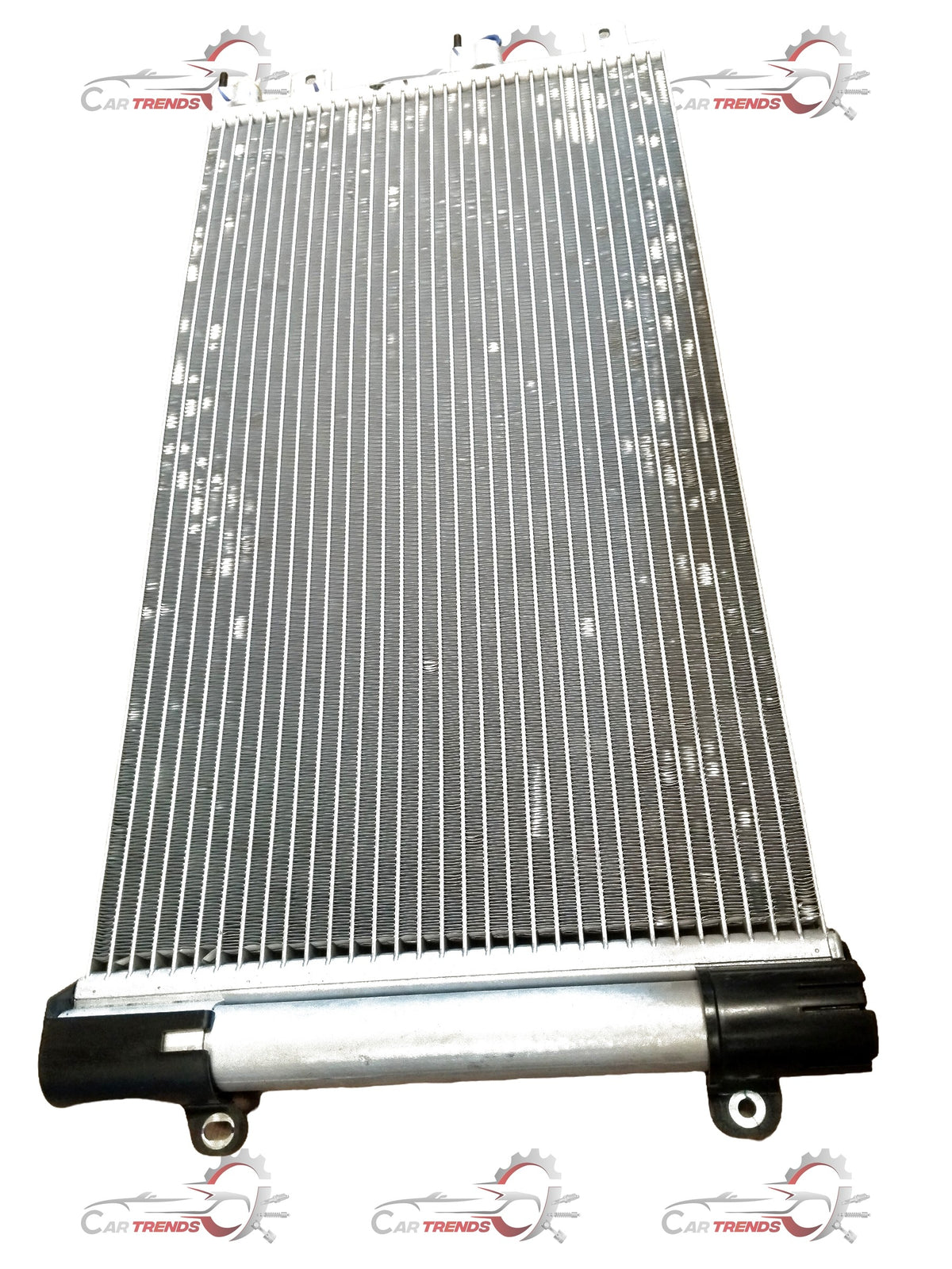 CarTrends air conditioning condenser for Tata Nexon, showing the metal radiator component used in vehicle cooling systems.