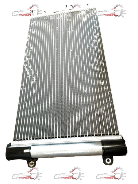 CarTrends air conditioning condenser for Tata Nexon, showing the metal radiator component used in vehicle cooling systems.