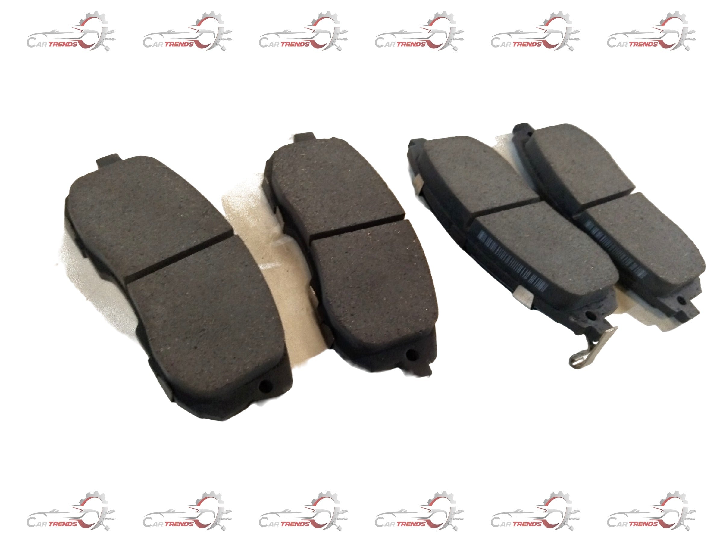 Front brake pad for Maruti Suzuki SX4, showing a close-up of the black friction surface and metal backing plate.