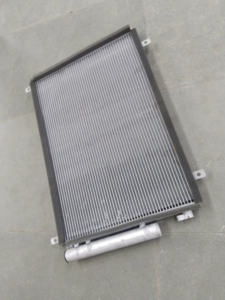 CarTrends Swift Deizre Type 3 condenser with multiple variants, showing close-up of the metal fins and connection points.