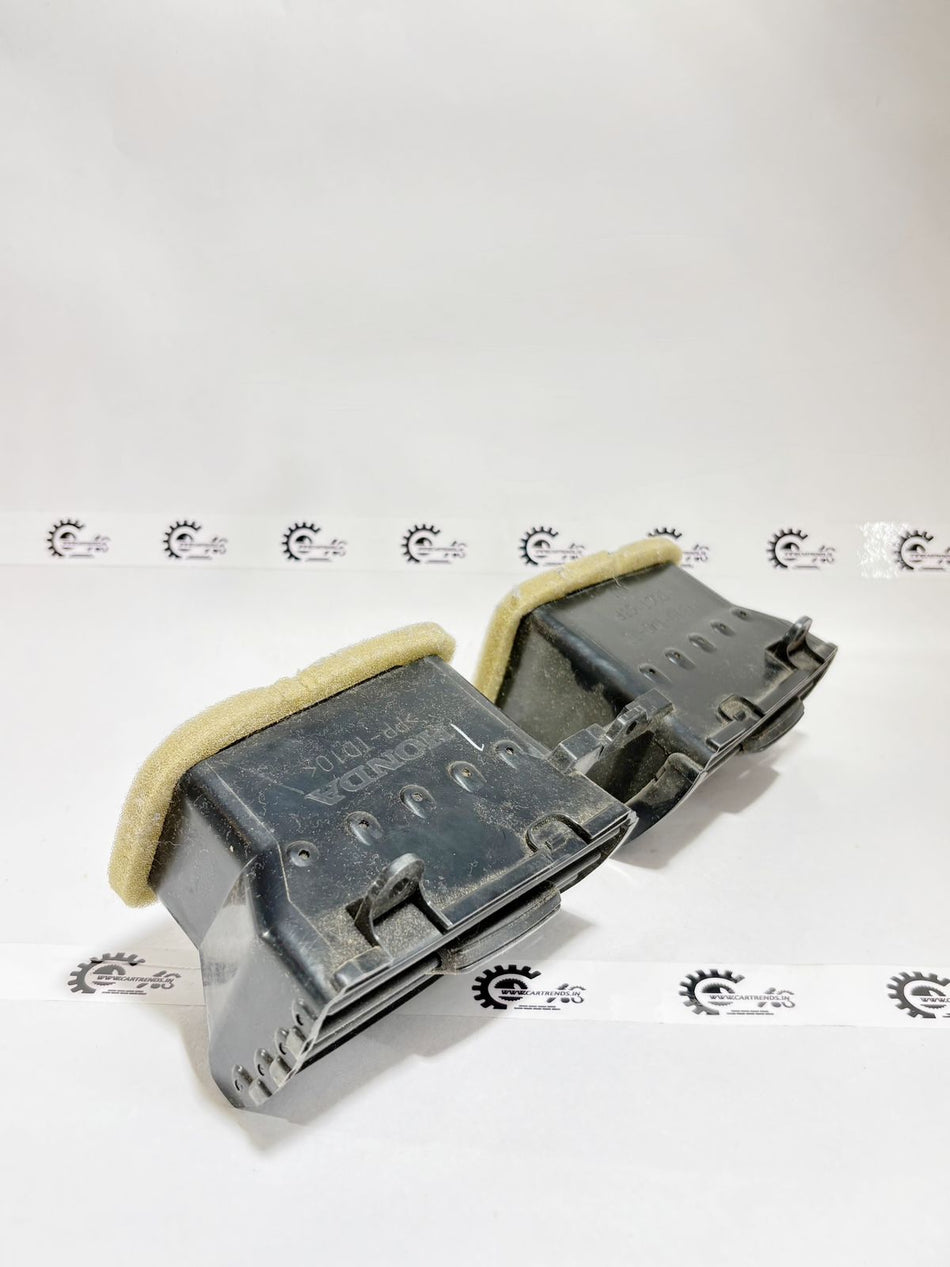 Honda City petrol air vent, CarTrends replacement part, shown in close-up front view with vents and details.