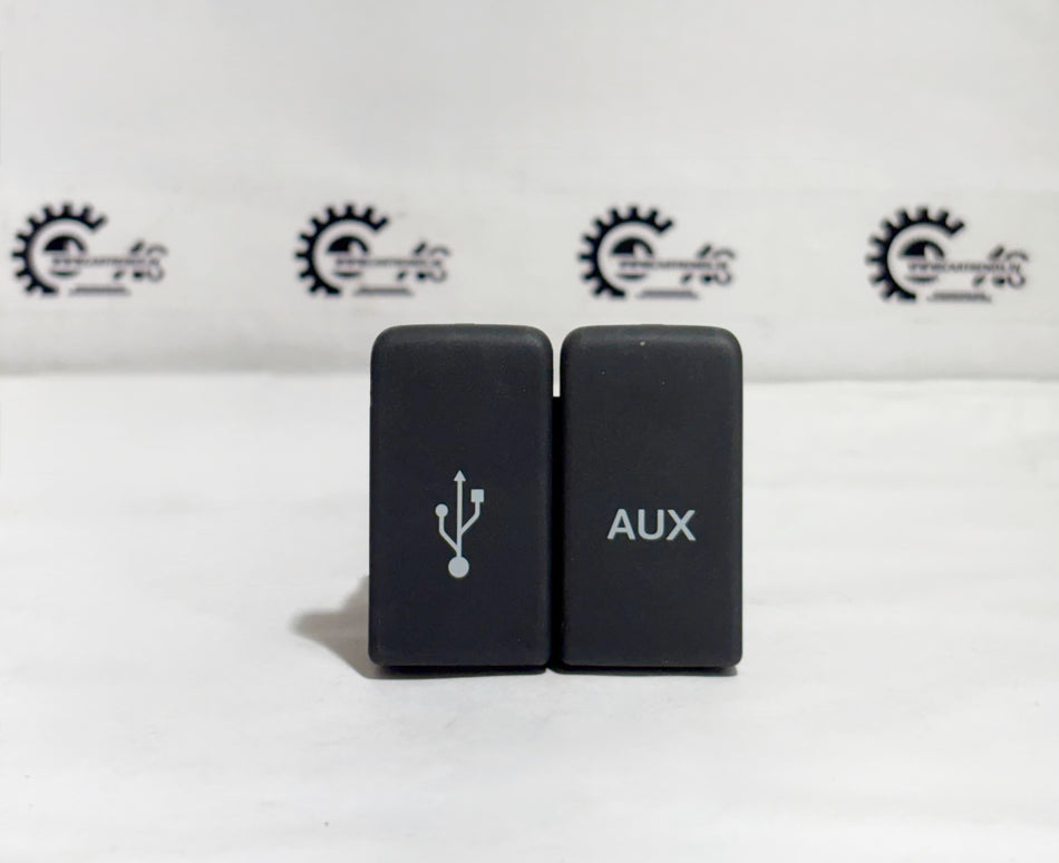Honda City AUX USB switch by CarTrends, front view showing the control button and connection port for audio input.