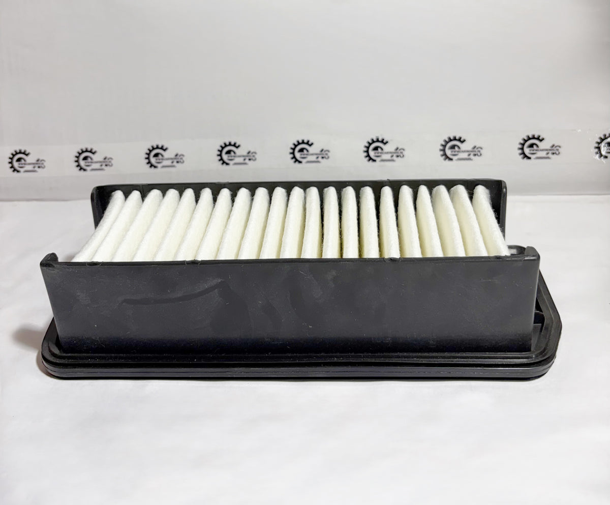 Maruti Suzuki air filter for Alto K10 model, part number 13780M65L00, shown from the back view, for engine air filtration.