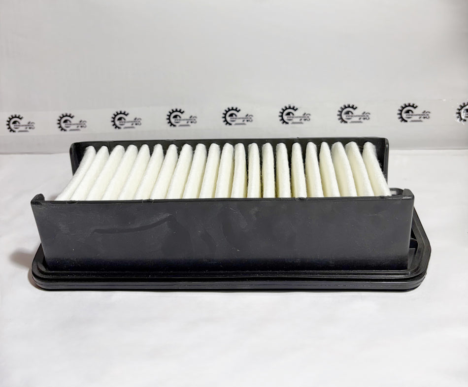 Maruti Suzuki air filter for Alto K10 model, part number 13780M65L00, shown from the back view, for engine air filtration.