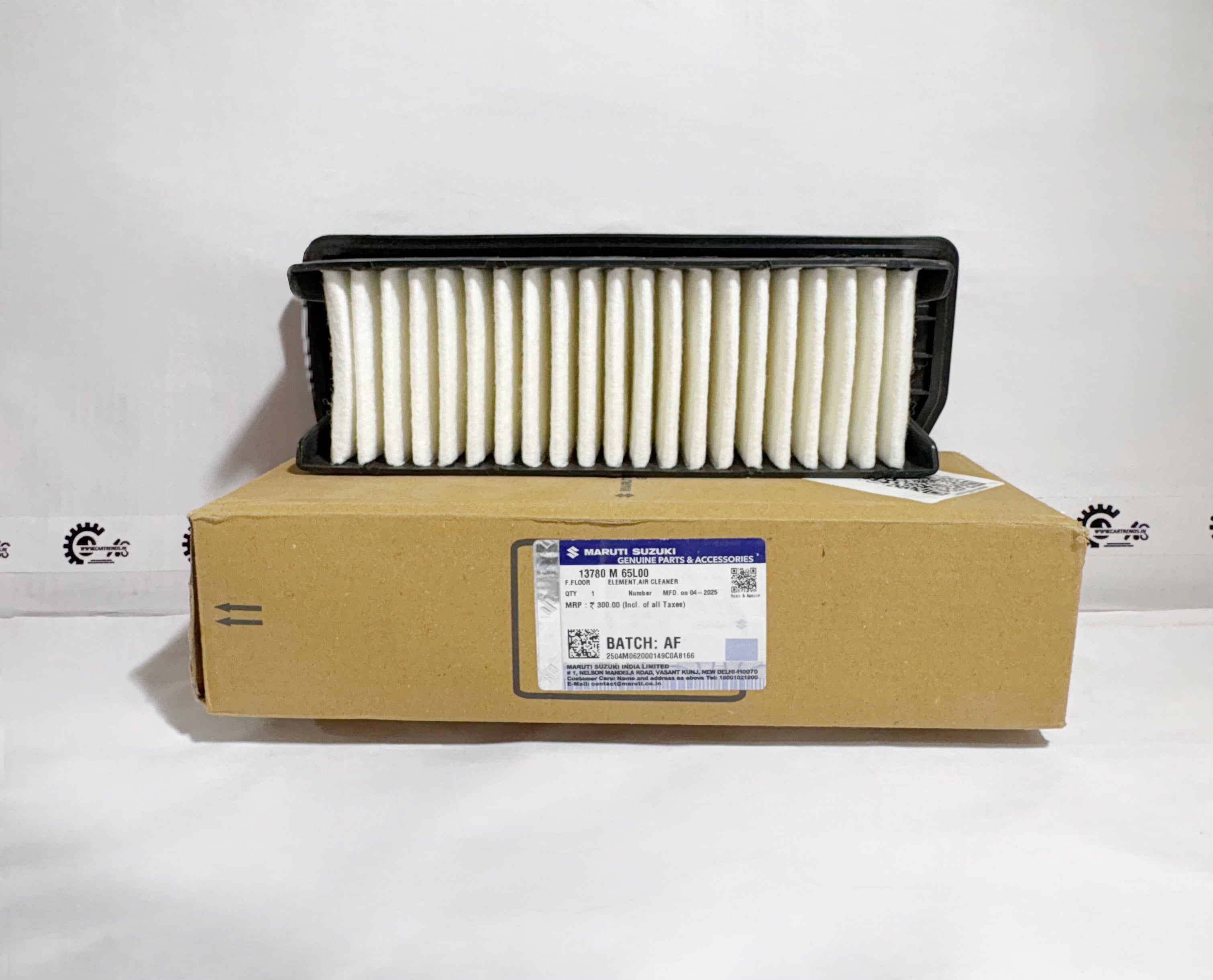 Maruti Suzuki Alto K10 air filter labeled ELEMENTAIR CLEANER 13780M65L00, right view showing clean filtering surface.
