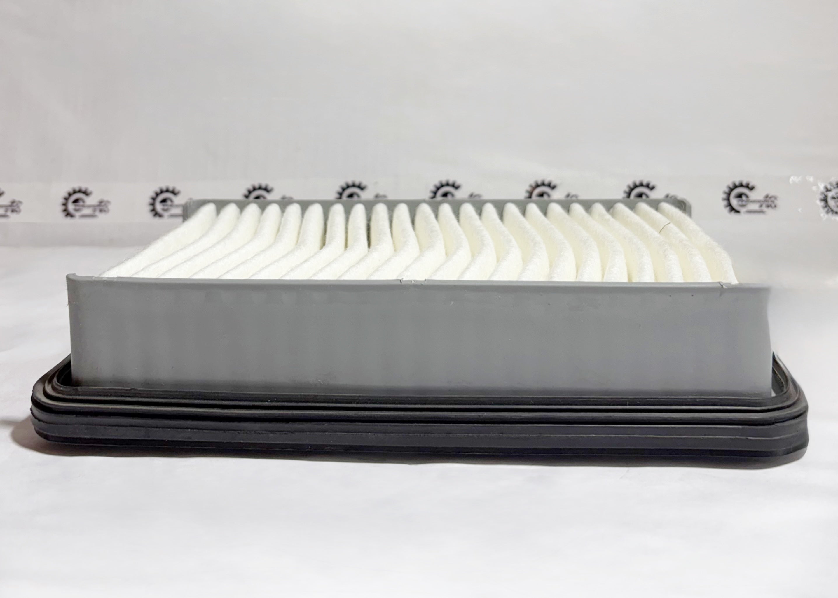 Maruti CarTrends Eeco Petrol air filter 13780M83B00 showing front view, designed to improve engine airflow and filtration.