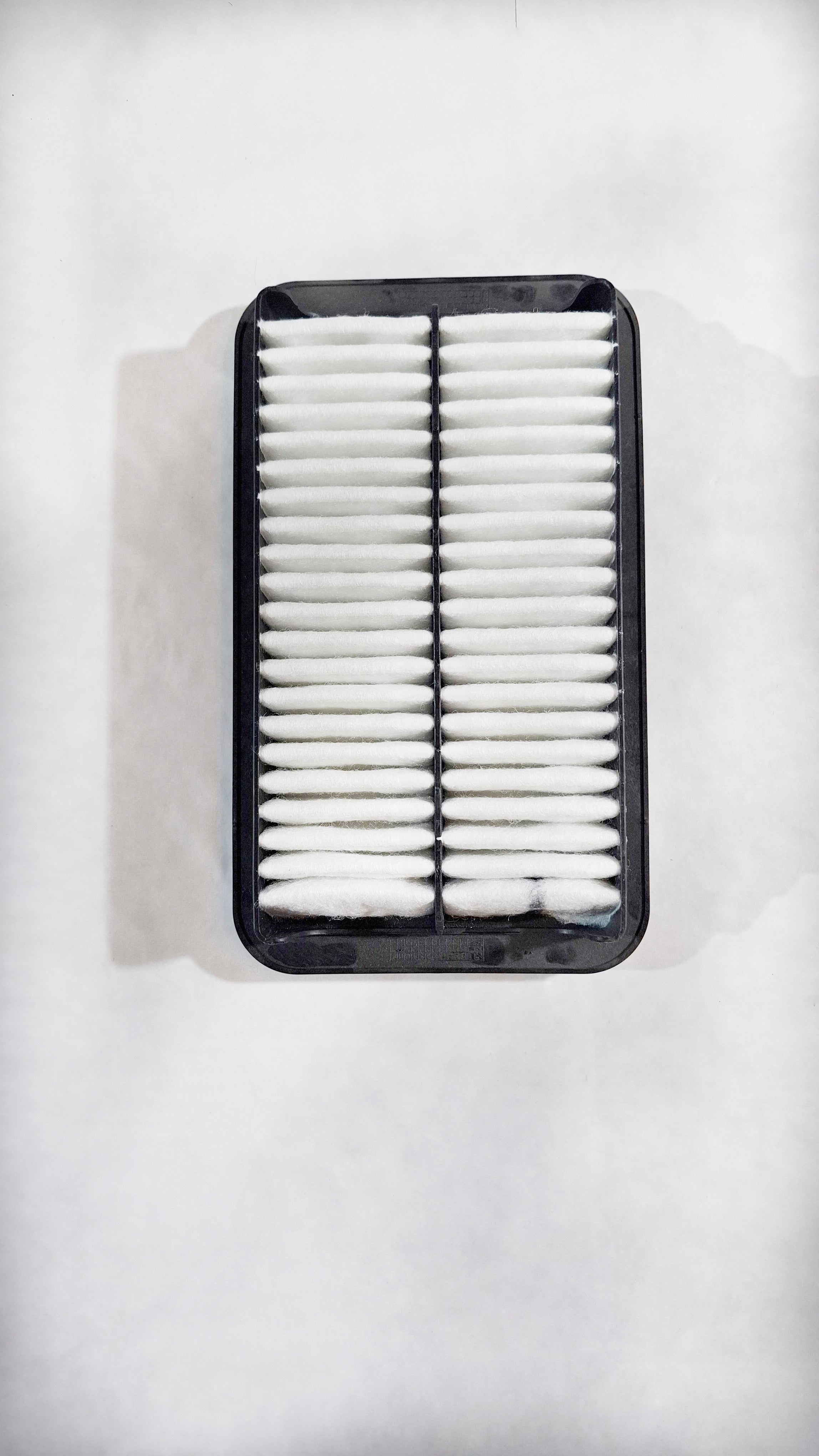 CarTrends Ritz petrol air filter 13780M83K00, front view showing pleated filter media for vehicle engine air intake.