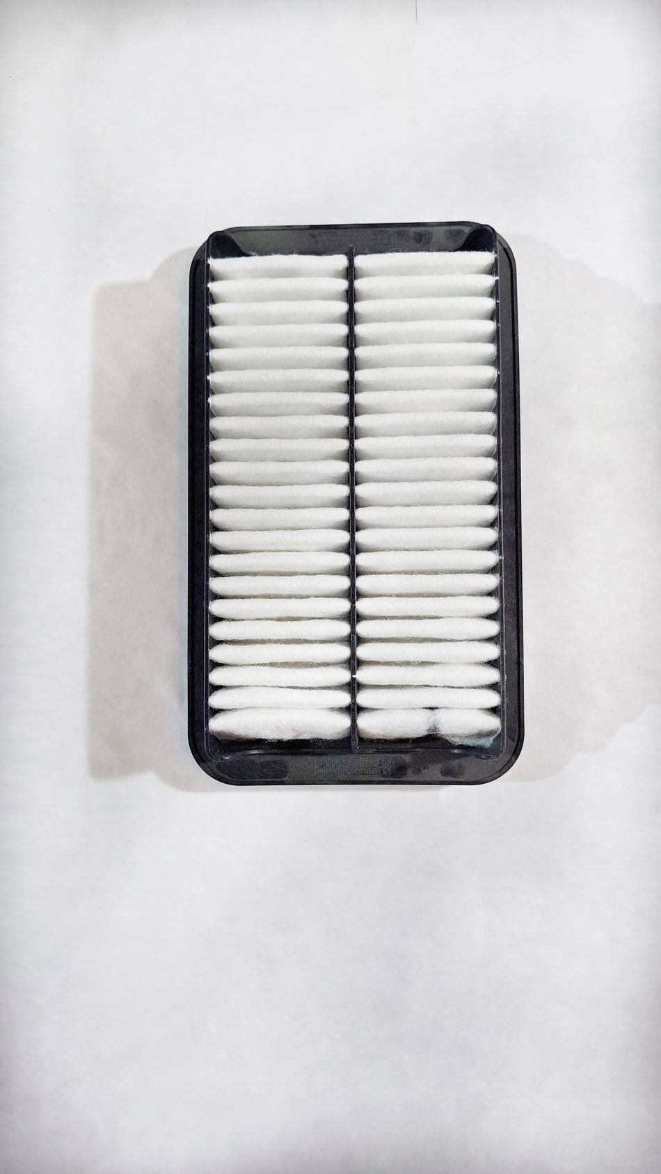 CarTrends Ritz petrol air filter 13780M83K00, front view showing pleated filter media for vehicle engine air intake.