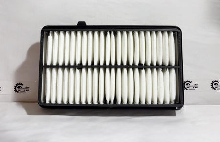 Maruti Suzuki Super Carry air filter model 13780M77PA0 showing the clean filter element in front view.