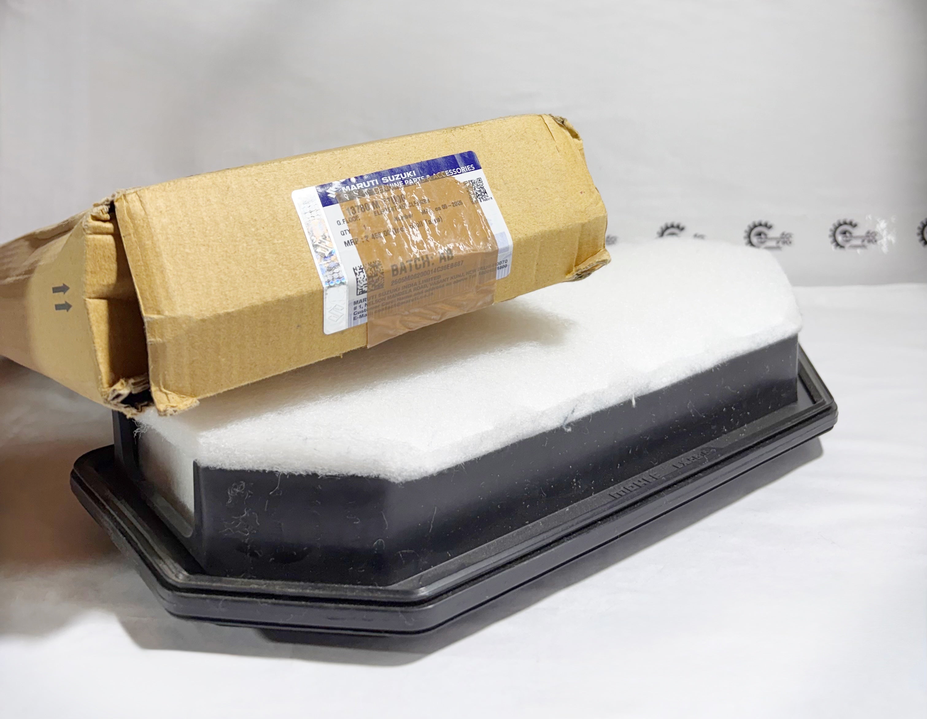 Maruti Suzuki Air Filter for Super Carry model, rear view image showing the clean, fitted air filter part.