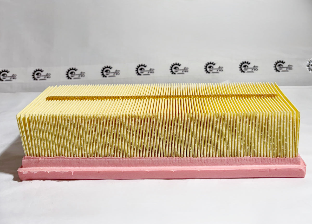 Maruti Suzuki WagonR K-series air filter with model 13780M67L00, shown in front view for engine air intake filtering.