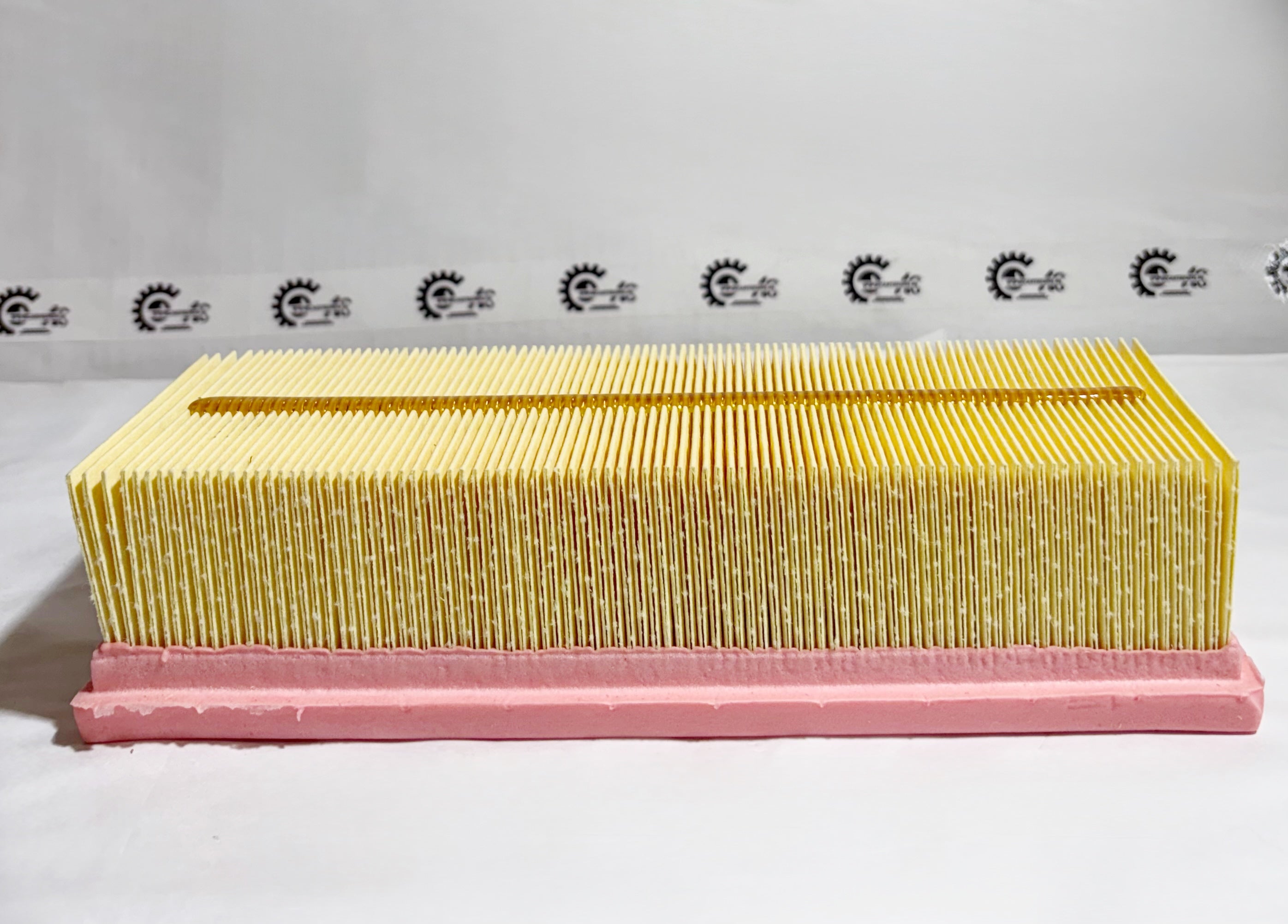 Maruti Suzuki WagonR K-series air filter with model 13780M67L00, shown in front view for engine air intake filtering.