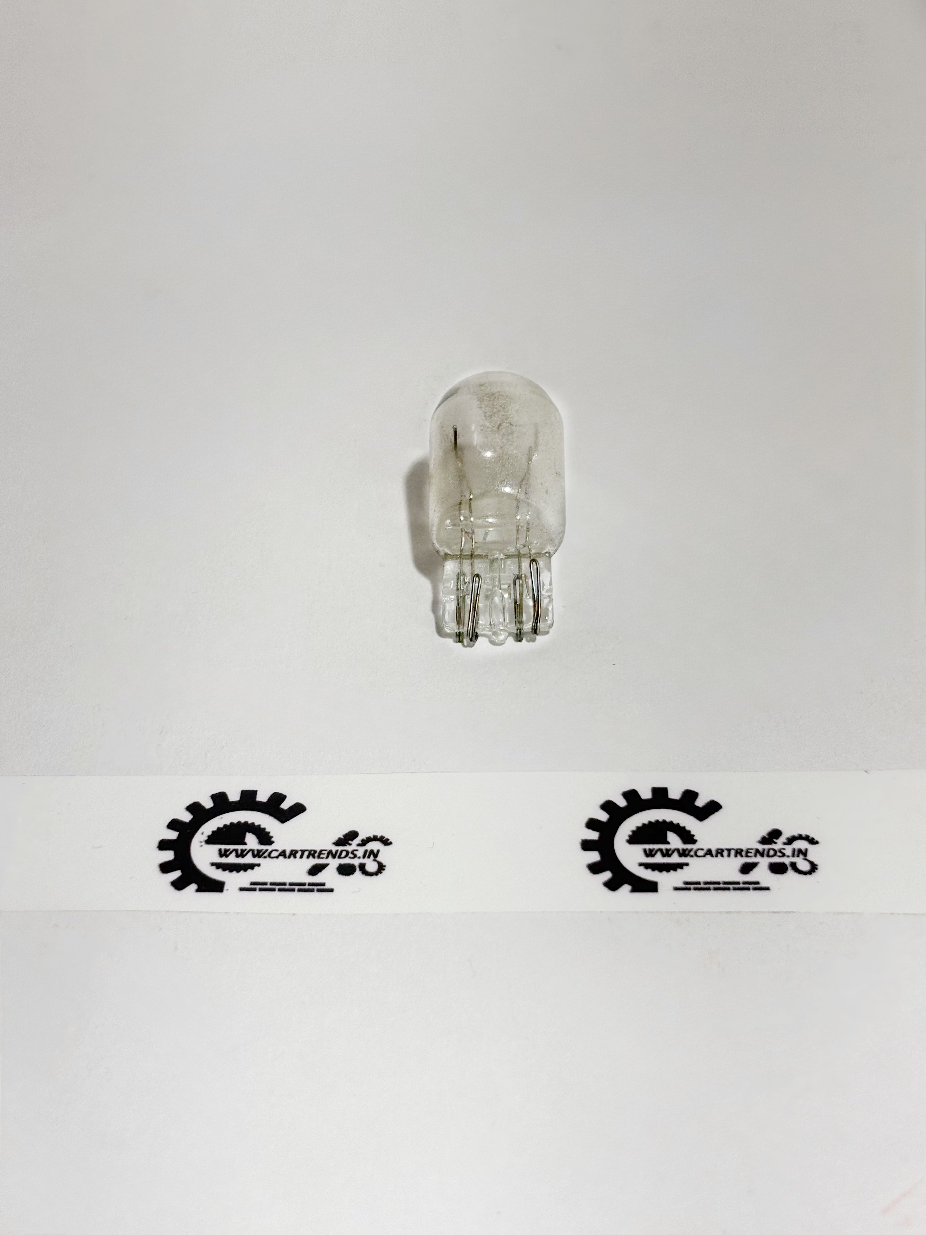 Honda 12V 21W/5W bulb model 34906ST5003, shown from the back, designed for vehicle lighting and electrical systems.