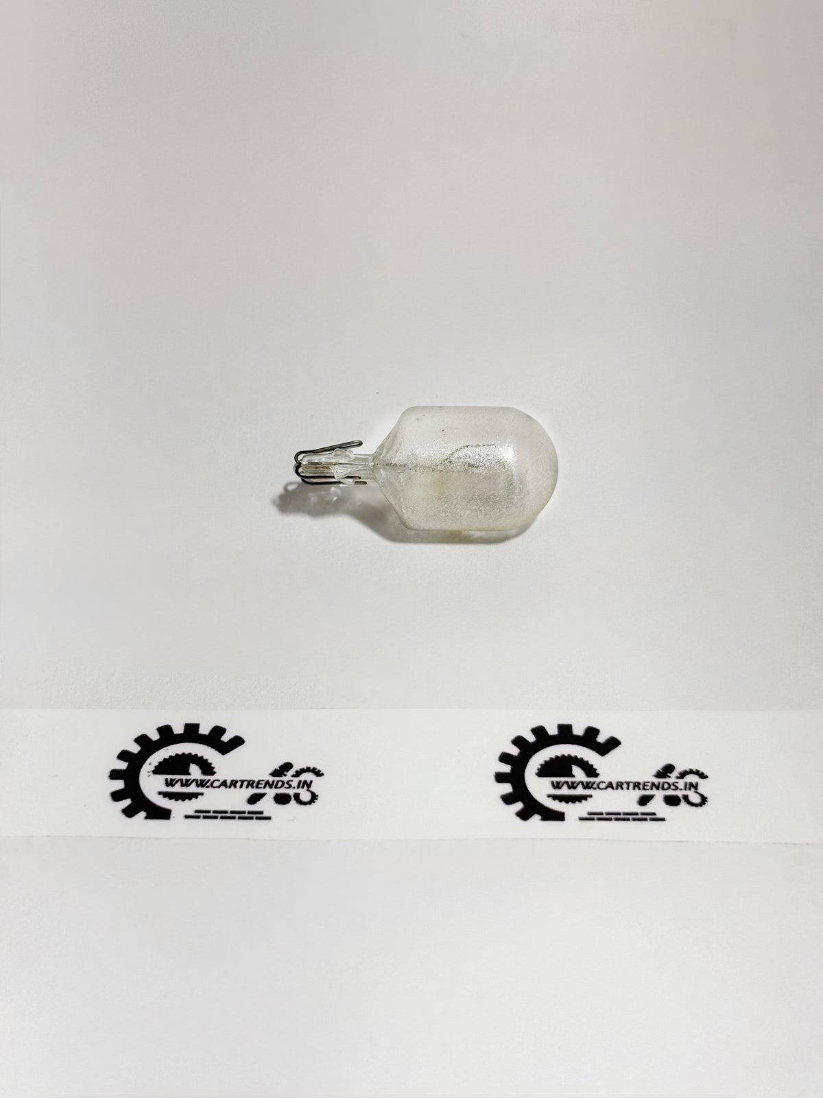 Honda 12V 21W/5W bulb for vehicle lighting, shown from the left side in the image.