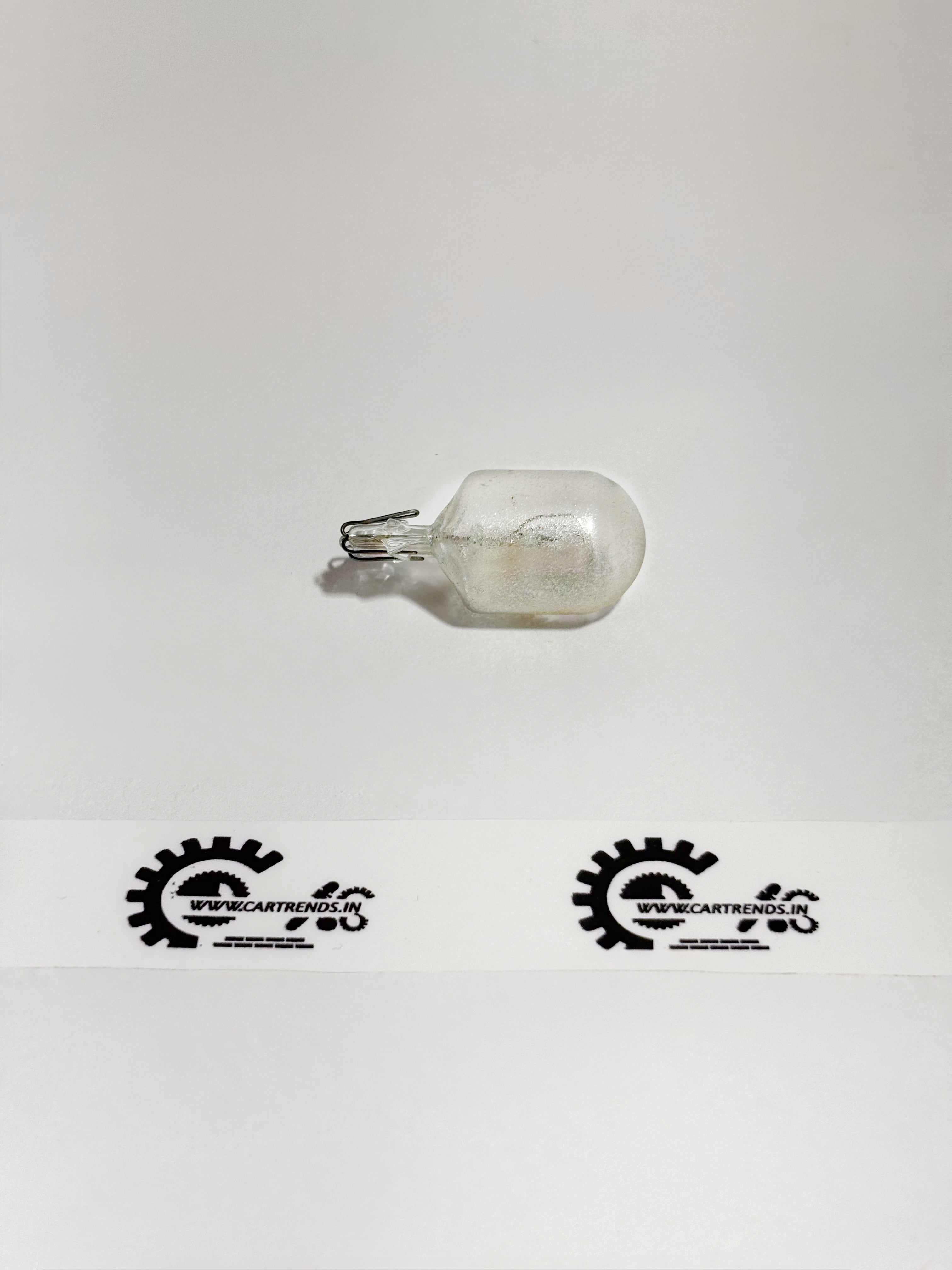 Honda 12V 21W/5W bulb for vehicle lighting, shown from the left side in the image.