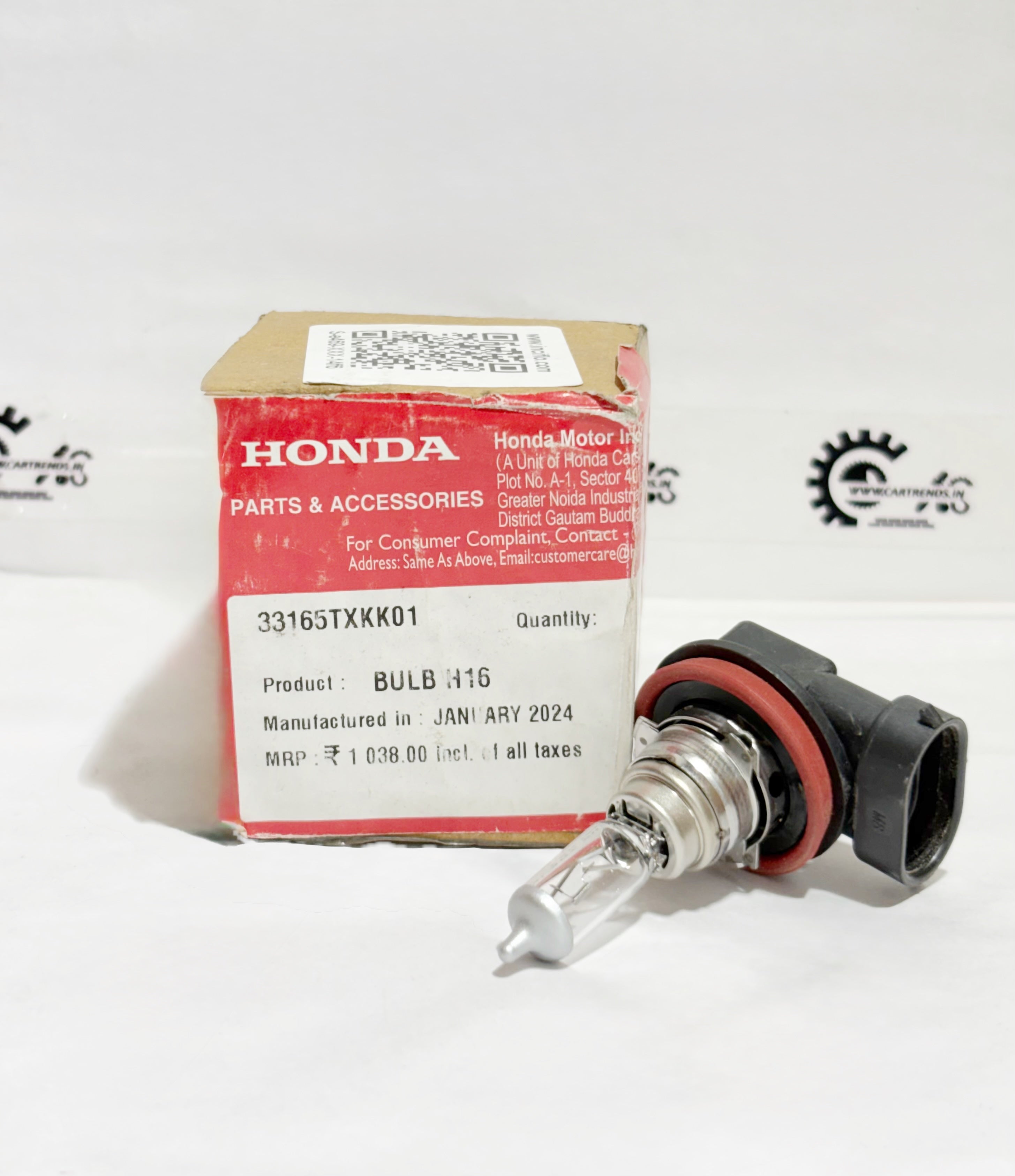 Honda BULB H16 33165TXKK01 installed in the right headlight for optimal visibility and illumination.