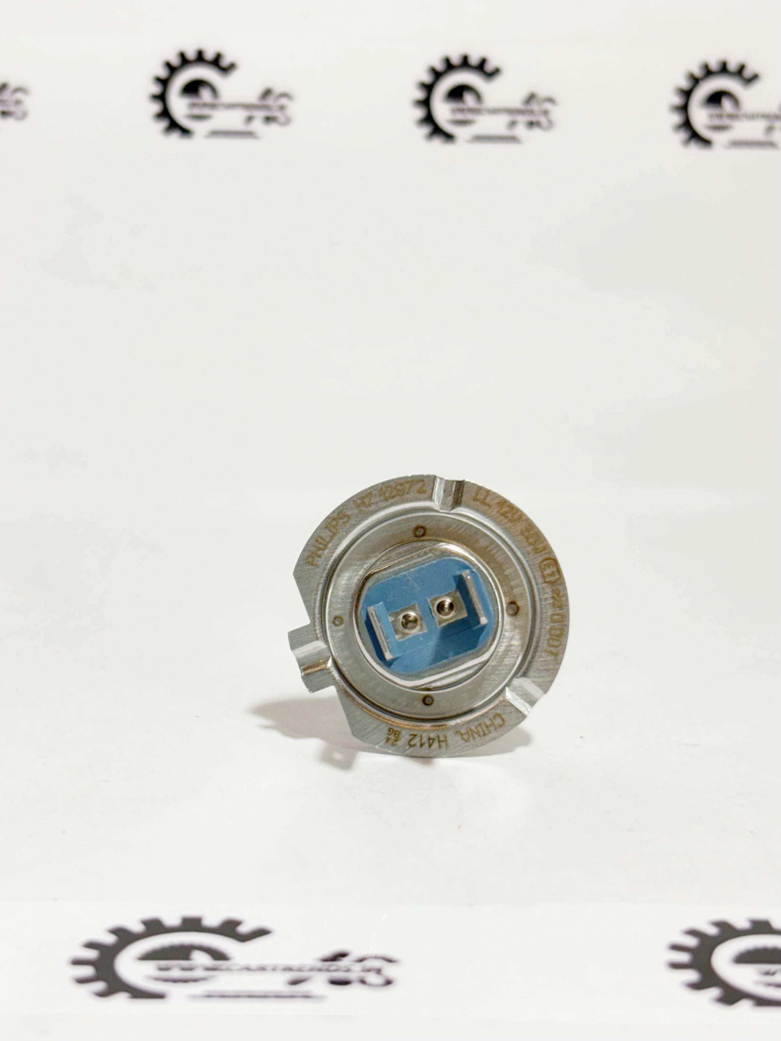 Honda H7 LL bulb model 33110SMGE01 shown from the back, designed for vehicle lighting and easy replacement.