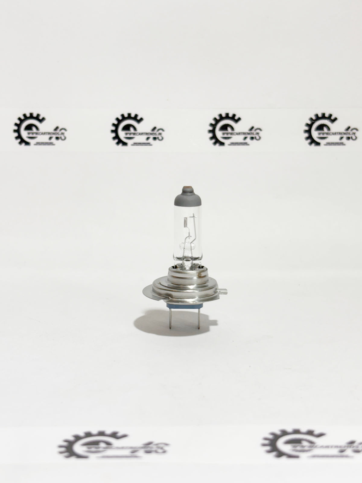 Honda H7 LL bulb, model 33110SMGE01, showing the front view of the automotive headlight bulb for Honda vehicles.