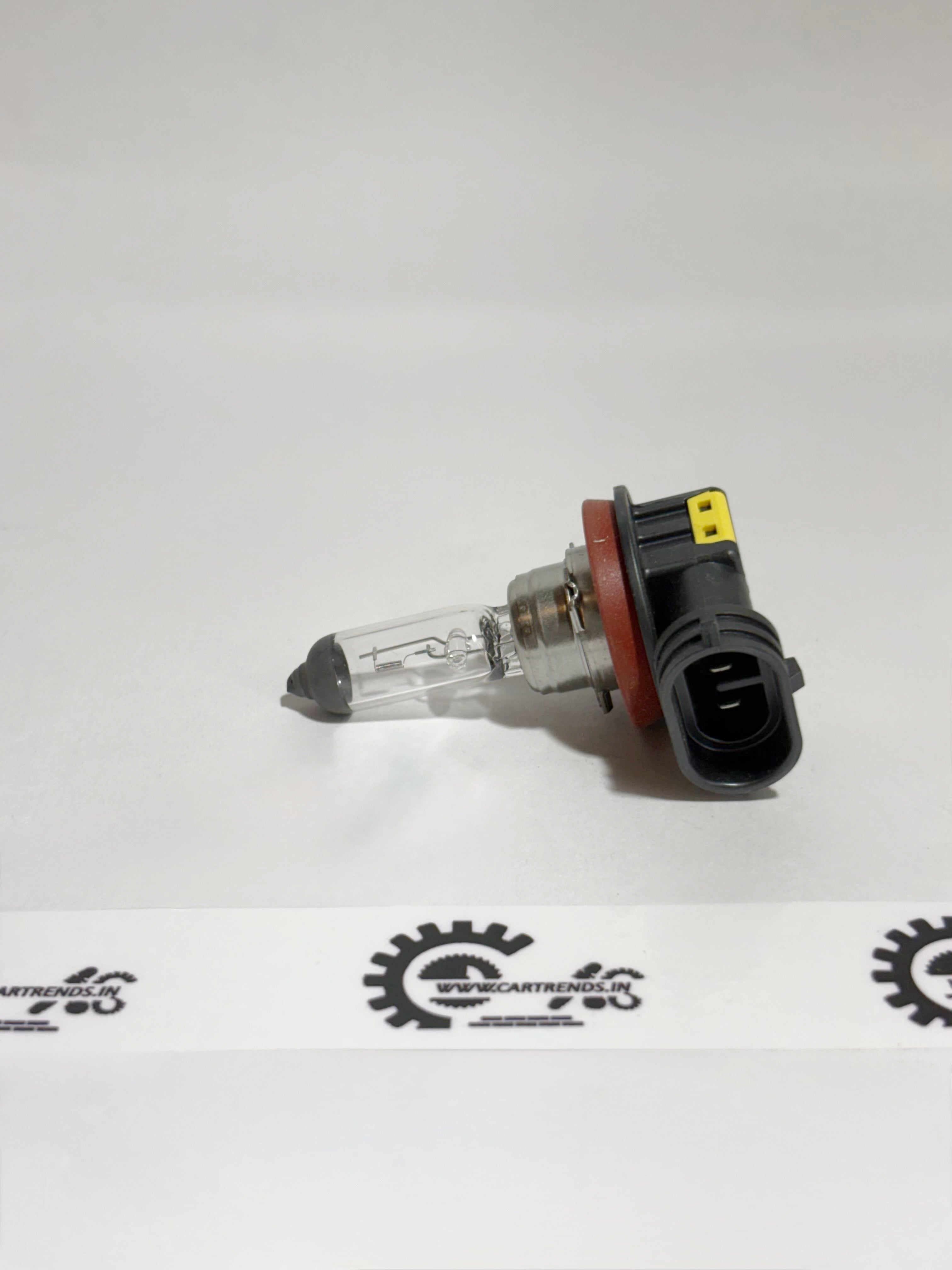 Honda BULB H8(LL) 33165TL0003 headlight bulb installed in the left side of a Honda vehicle.