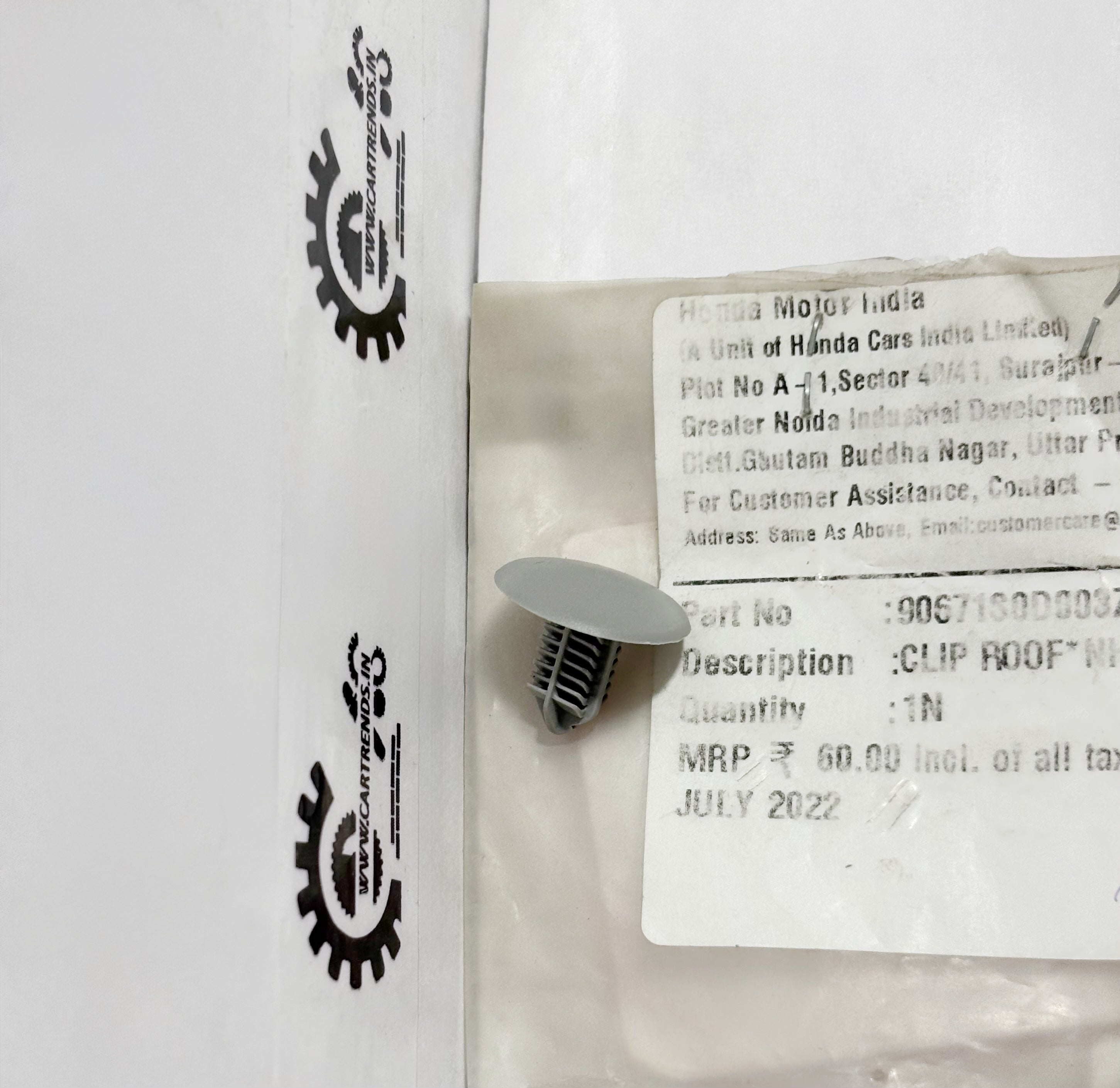 Left side view of Honda CLIP ROOF NH120L clip part with model number 90671S0D003ZF, showing the clip attached to the roof.