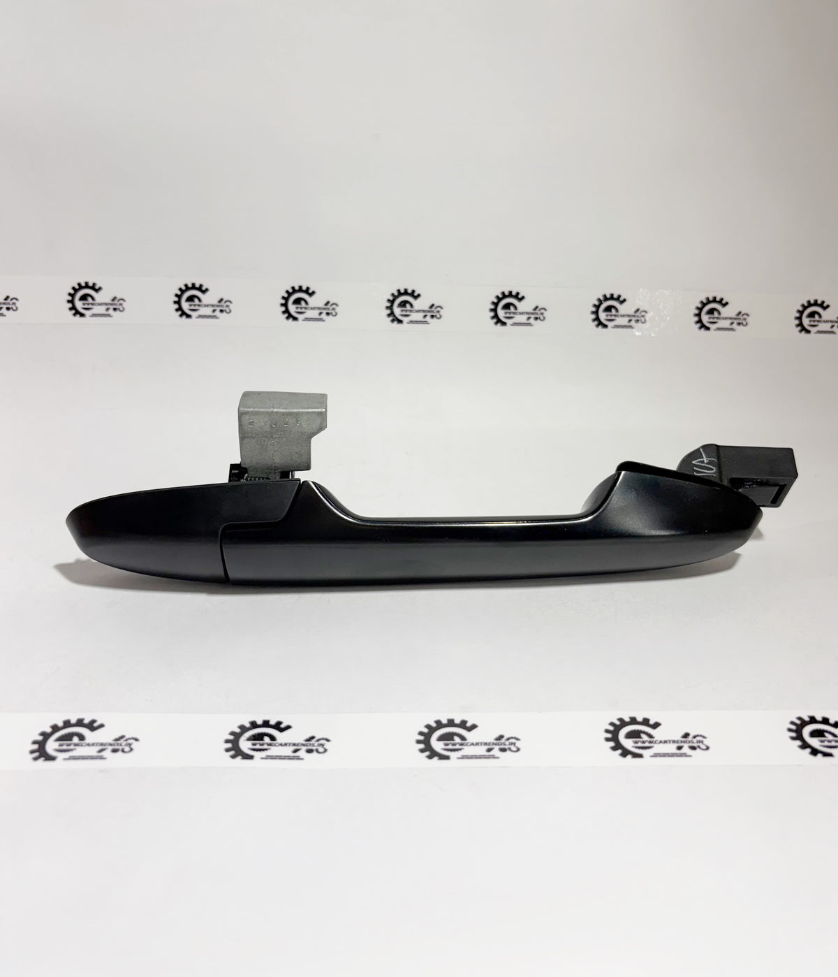 Honda handle assembly for right rear door, showing the exterior side with grip and mounting components.