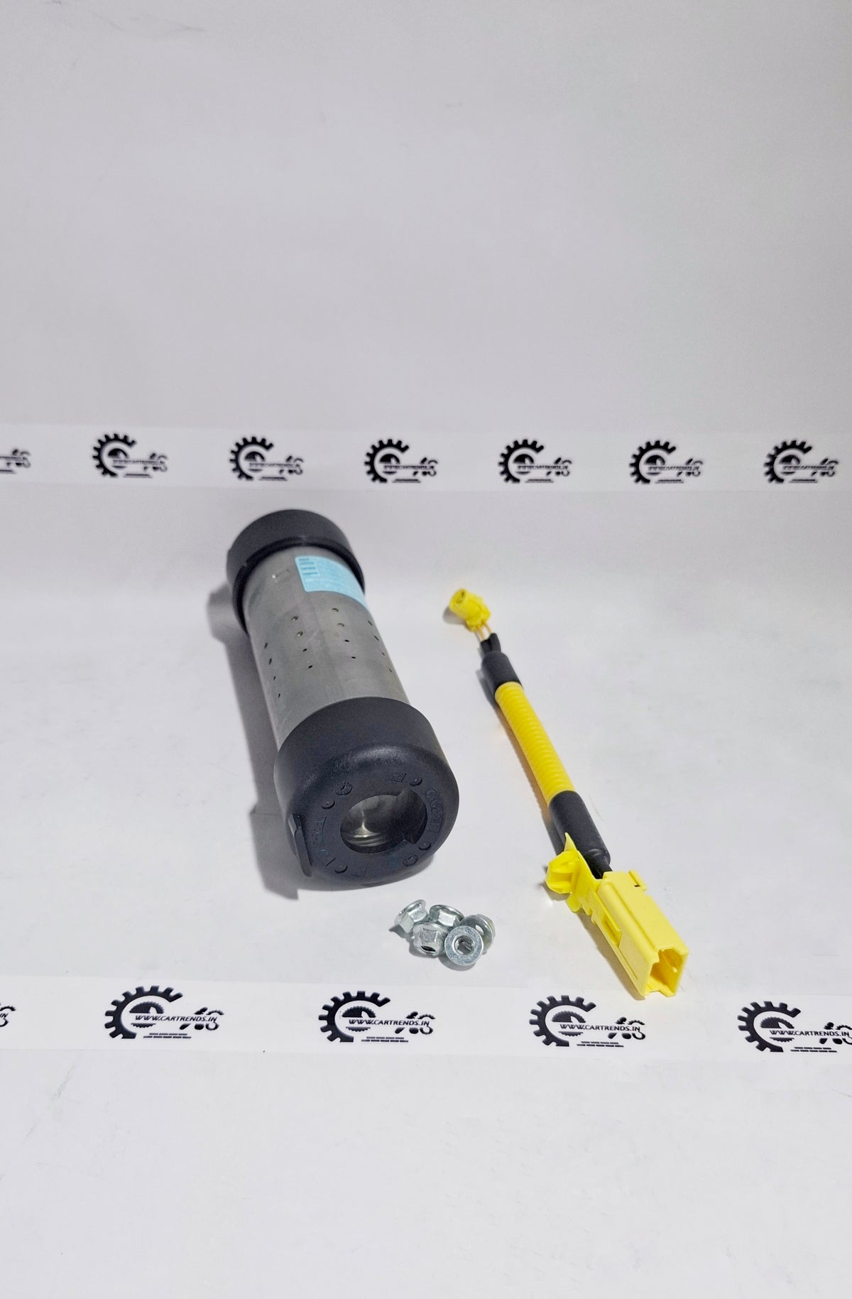 Honda KIT.AS Inflator C 04790SNB405, left view showing the compact vehicle inflator component.