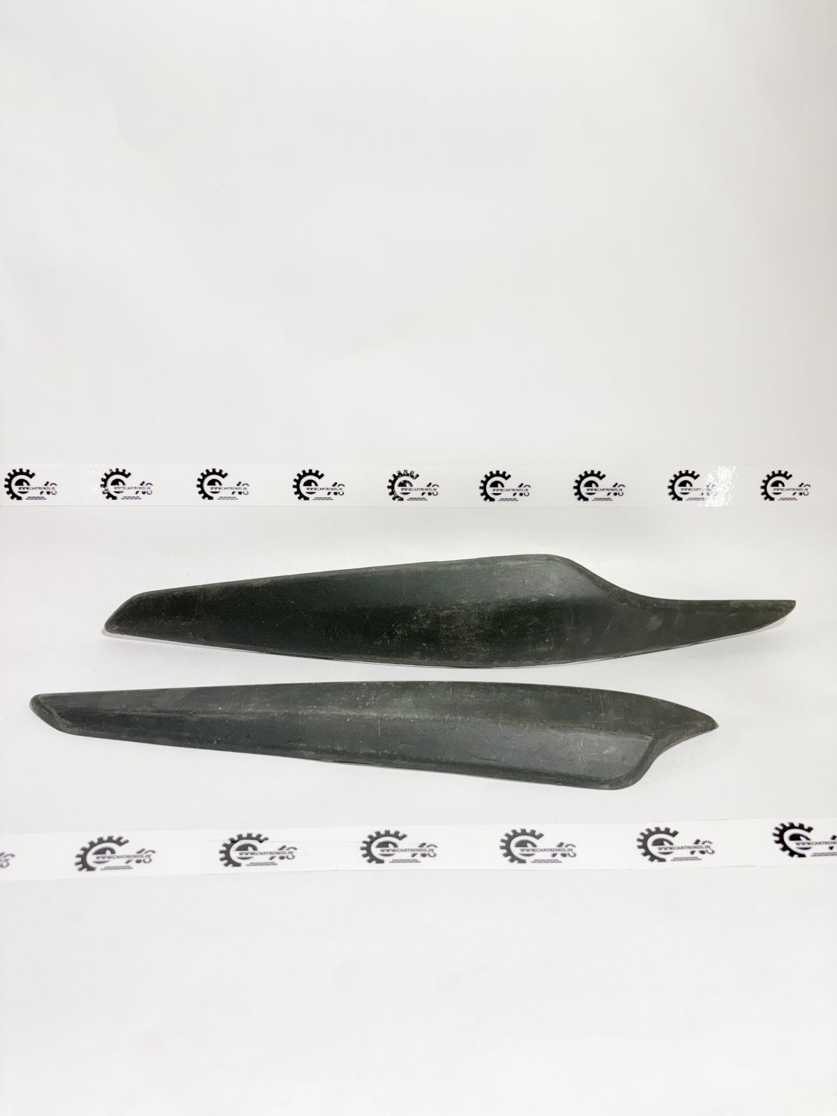 Honda bumper corner protector set for front and rear, showing black plastic protectors on vehicle corners.