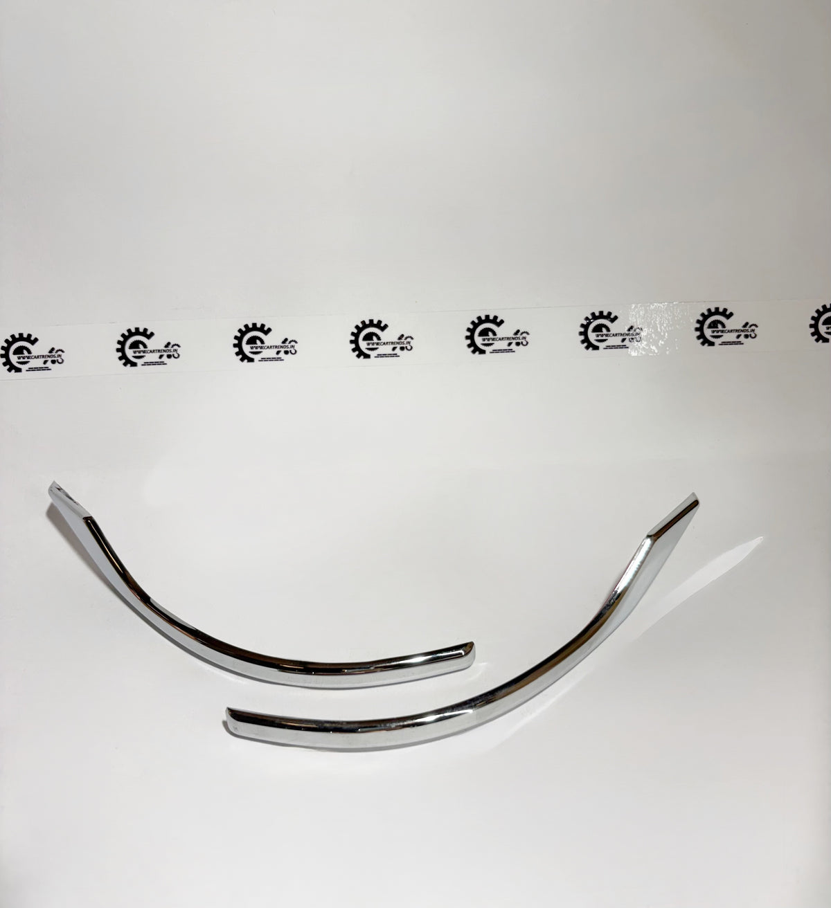 Honda door mirror garnish kit, front view showcasing the sleek chrome trim for a Honda vehicle's door mirror area.