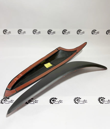 Left view of Honda bumper protector kit, model 08P03T9C700A, designed to shield the vehicle's bumper from damage.