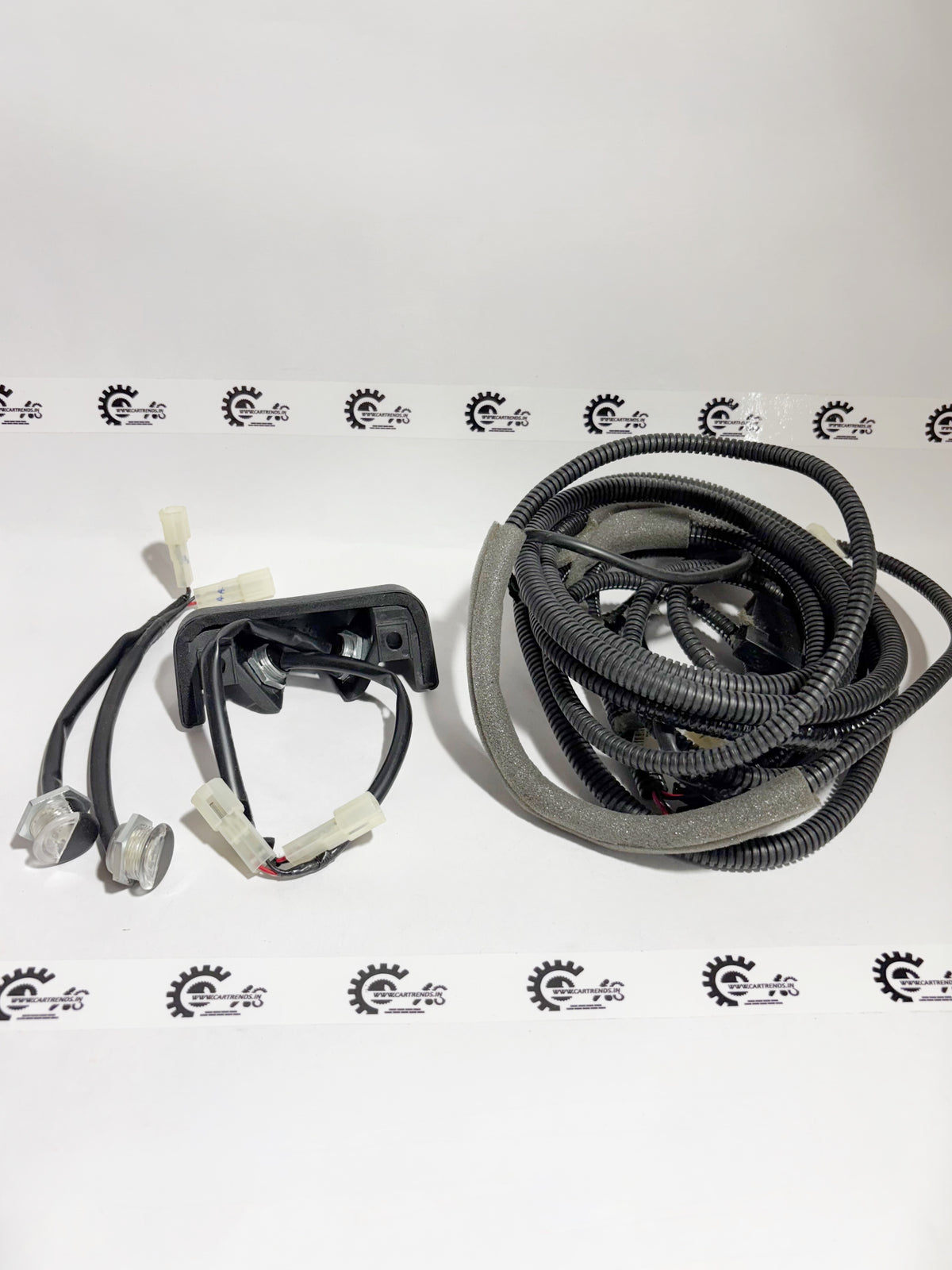 Honda leg room lamp kit, model 08E10PG4700B, installed on the left side of the vehicle interior lighting system.