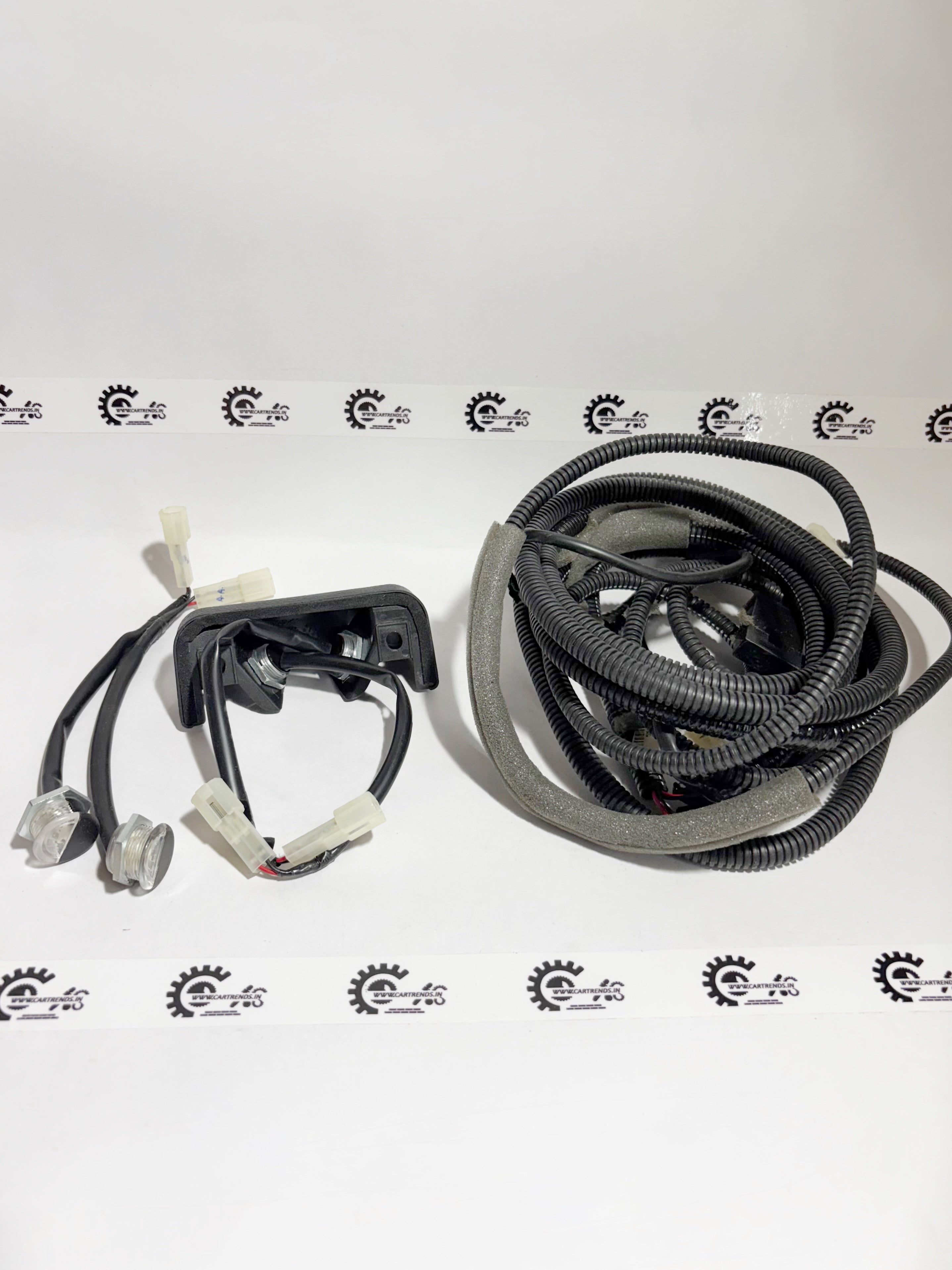 Honda leg room lamp kit, model 08E10PG4700B, installed on the left side of the vehicle interior lighting system.
