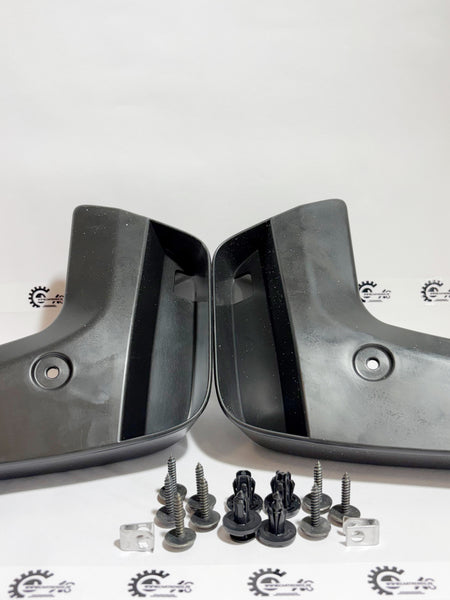 Honda mud guard set with left rear mud flap, designed for Honda vehicle, showing the black plastic mud guard and mounting points.