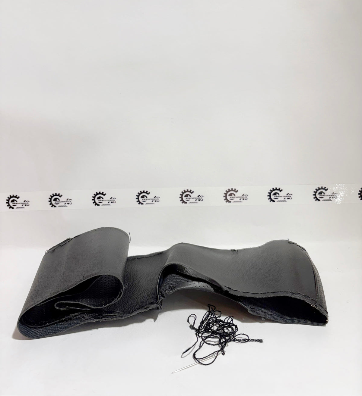 Honda steering wheel cover kit showing the left side, made for a secure fit and improved grip on the steering wheel.