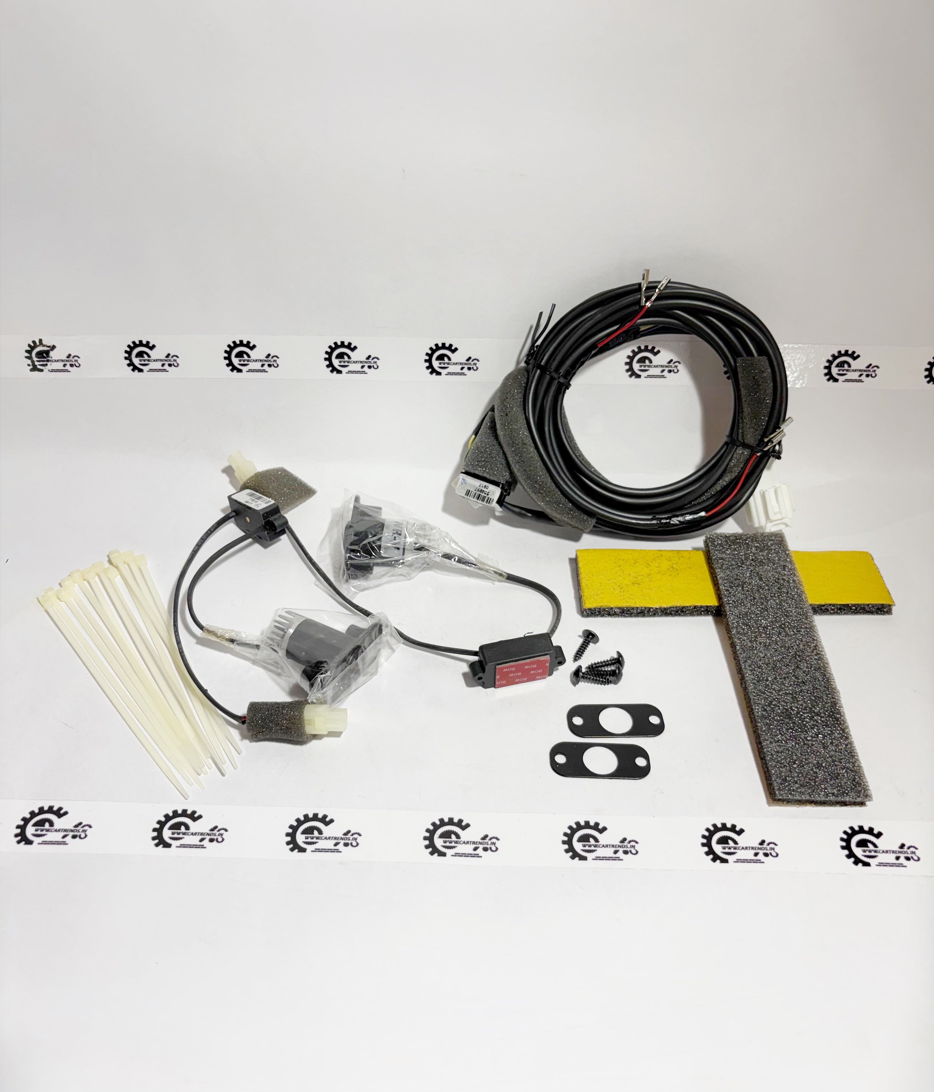 Honda WRV logo projector kit featuring front view of the projector with Honda branding and installation components.