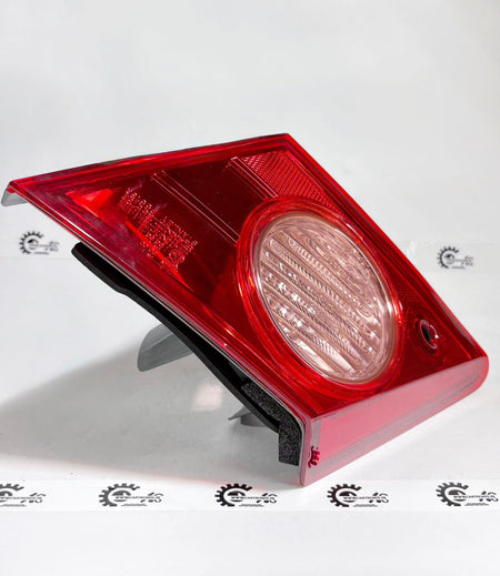 Honda City ZX petrol lamp unit right lid, showing the rear view with mounting details and wiring connections.
