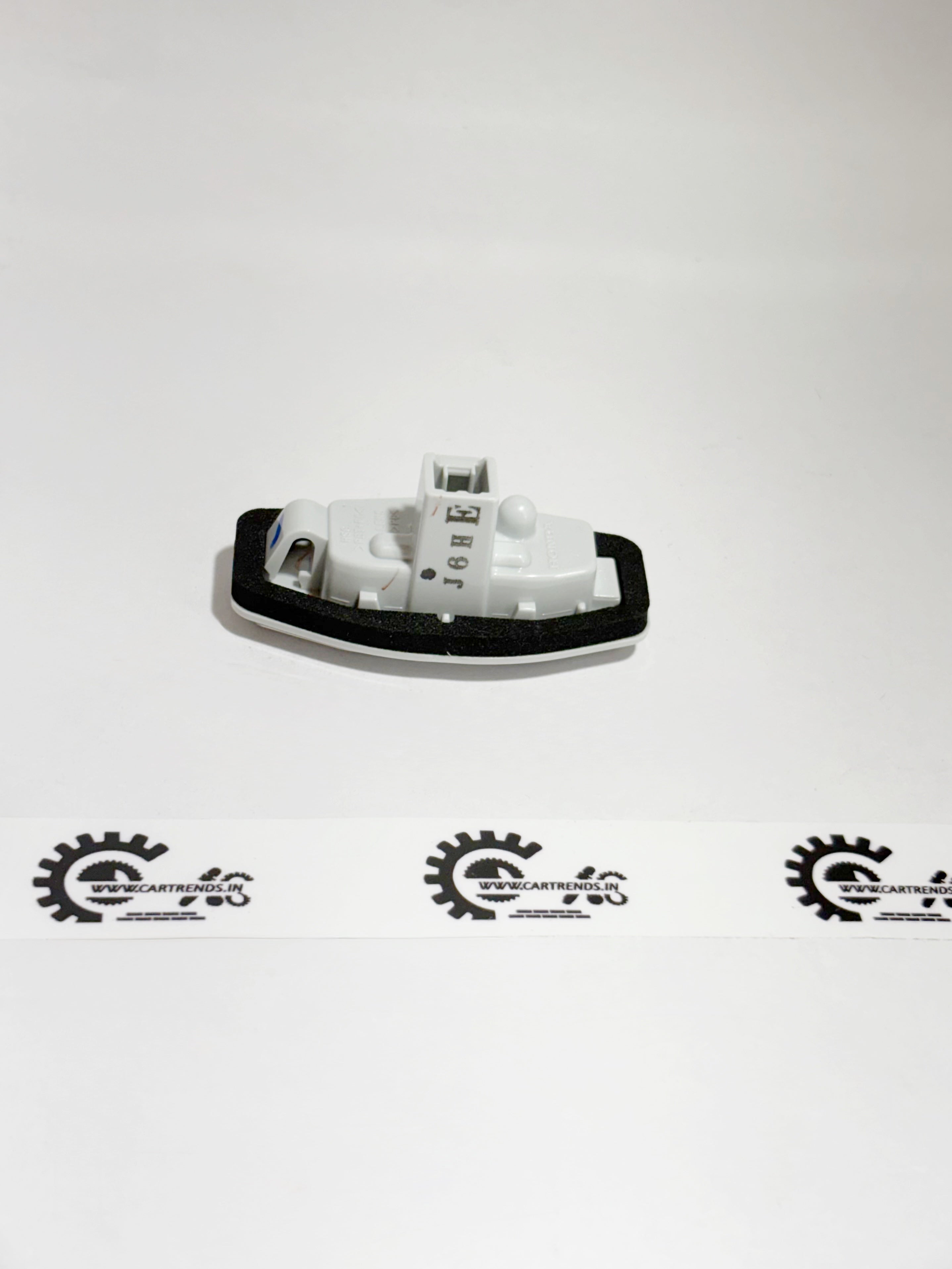 Honda license light assembly, part 34100T9A003, showing the rear view with mounting details and electrical connections.