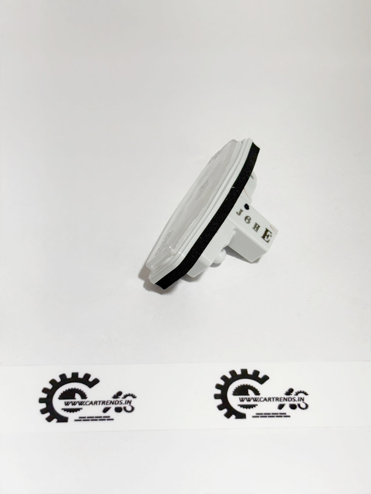 Honda license light assembly part 34100T9A003, left side view showing lens and mounting details