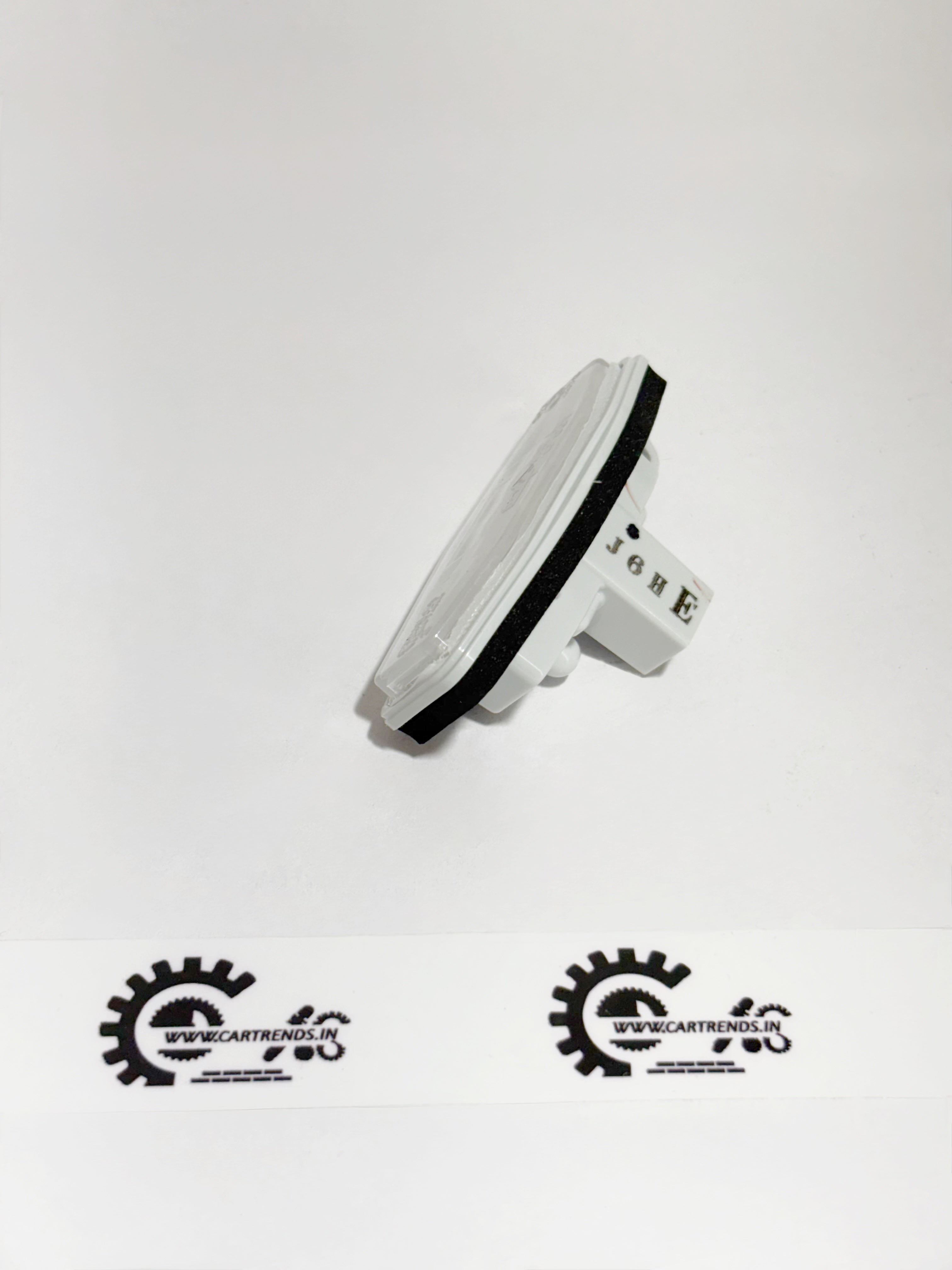 Honda license light assembly part 34100T9A003, left side view showing lens and mounting details