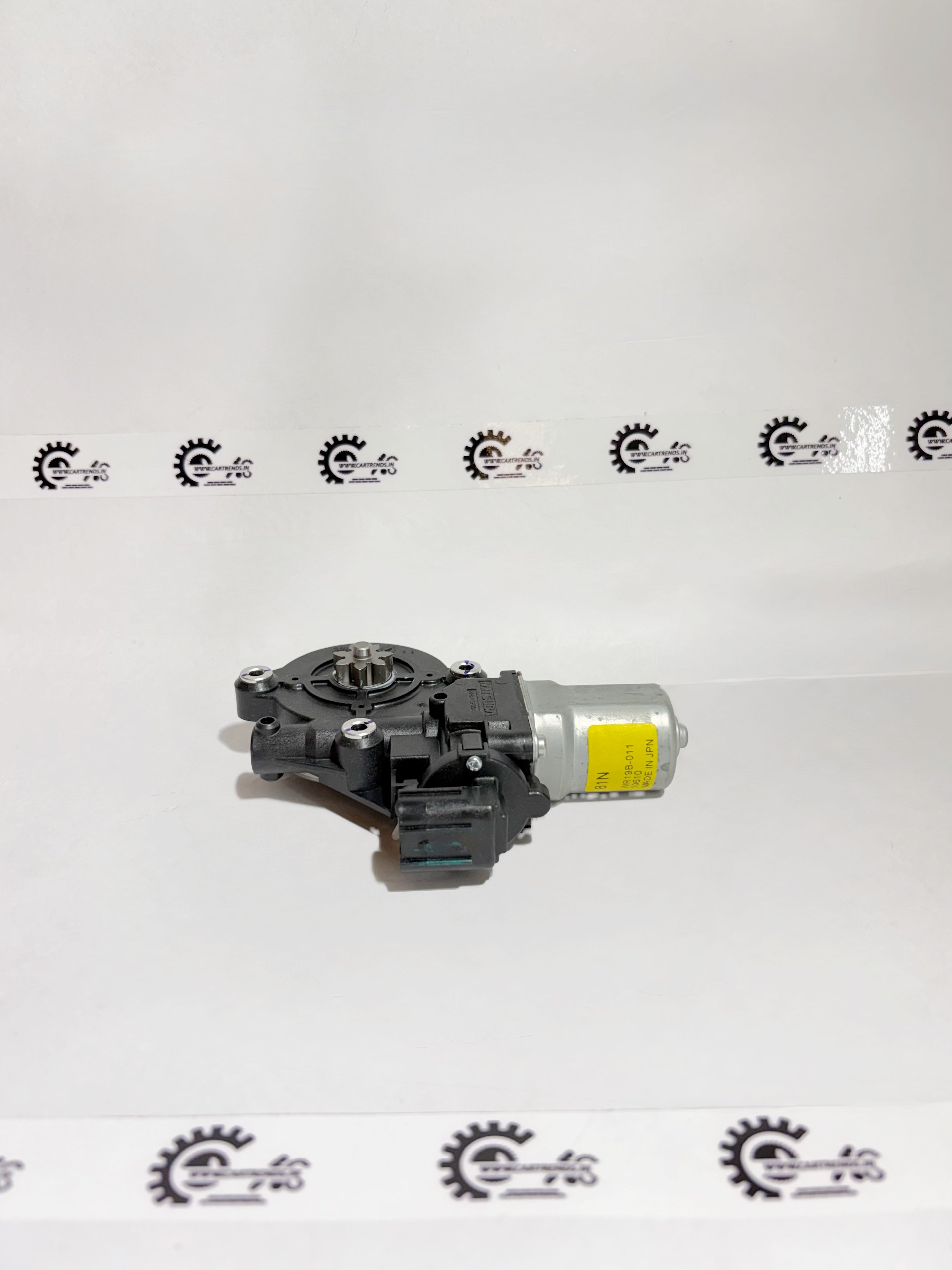 Honda motor assembly for front right window, showing the black electric window motor with wiring and mounting components.