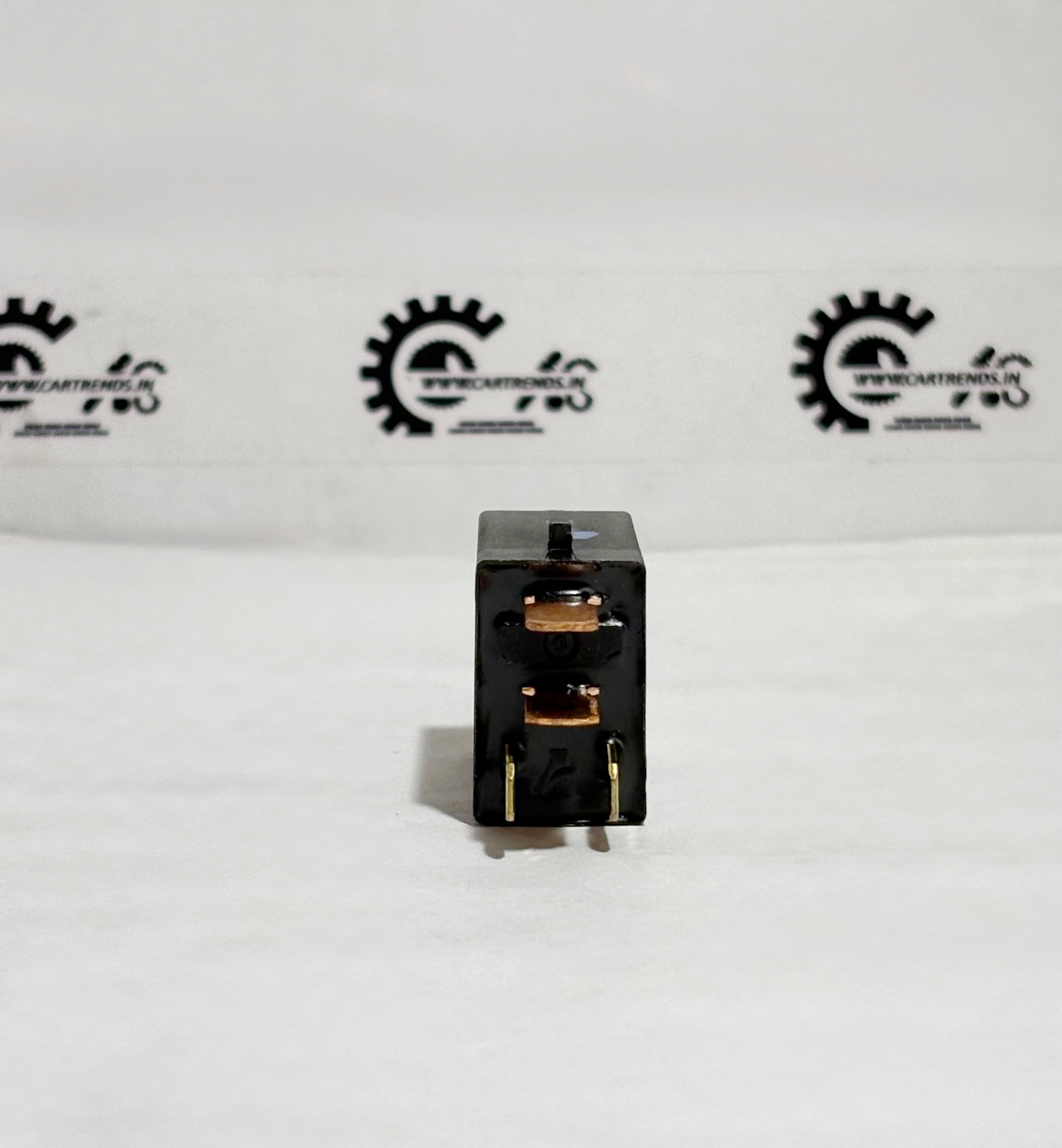 Honda relay assembly ISO 39794TSVW01, micro relay module with visible terminals and black plastic housing, viewed from the back.