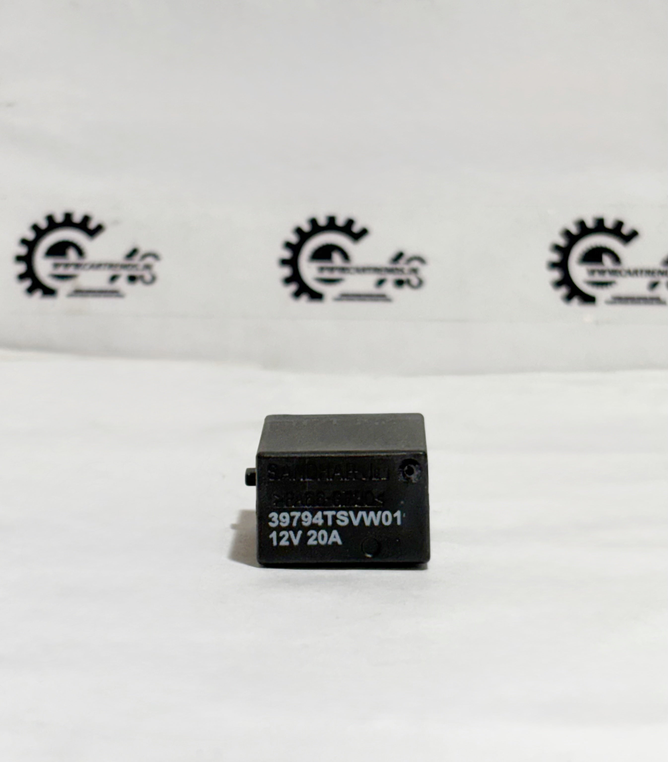 Honda relay assembly ISO 39794TSVW01, micro relay unit with multiple connection terminals, viewed from the left side.