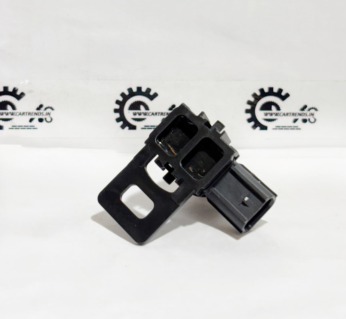 Honda parking sensor assembly with clip down, shown from the back in this image. Compatible with Honda vehicle models.