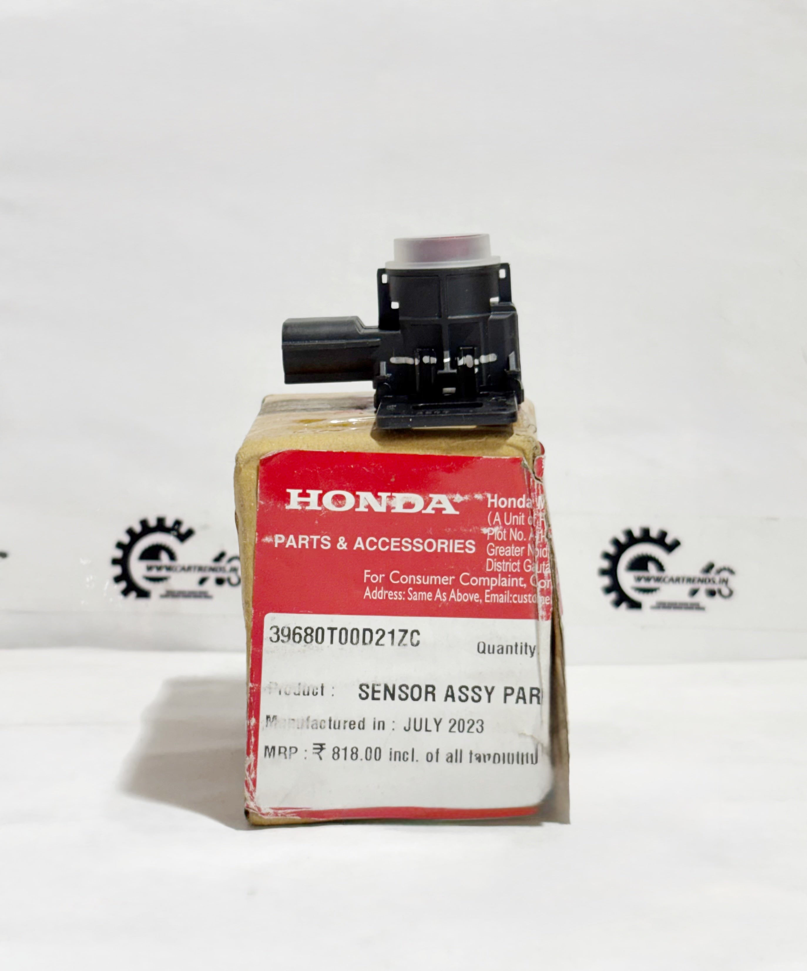 Honda parking sensor assembly with clip, shown on the left side, for improved vehicle parking assistance.