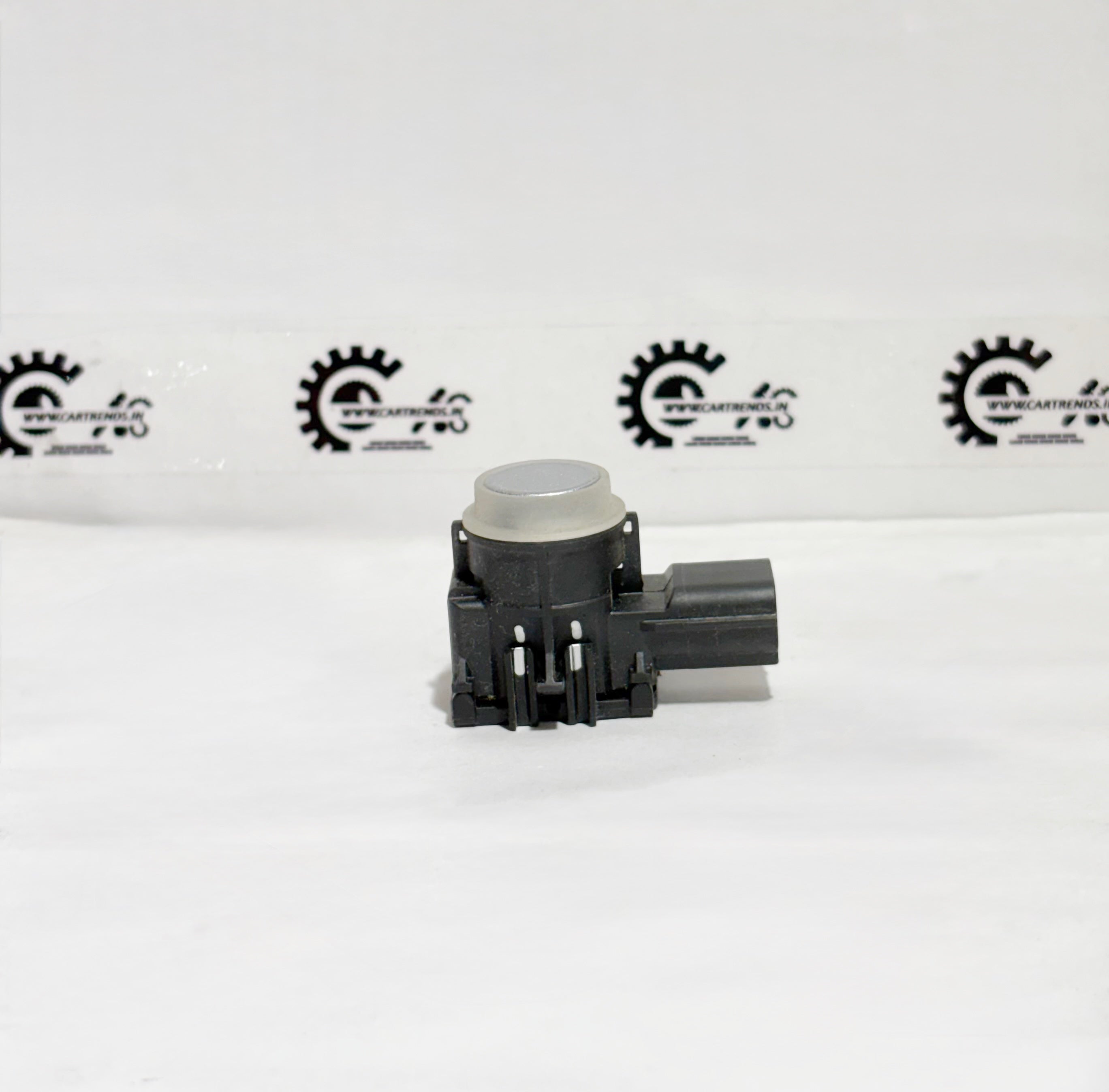Honda parking sensor assembly with clip, shown on the left side, designed for precise parking assistance.